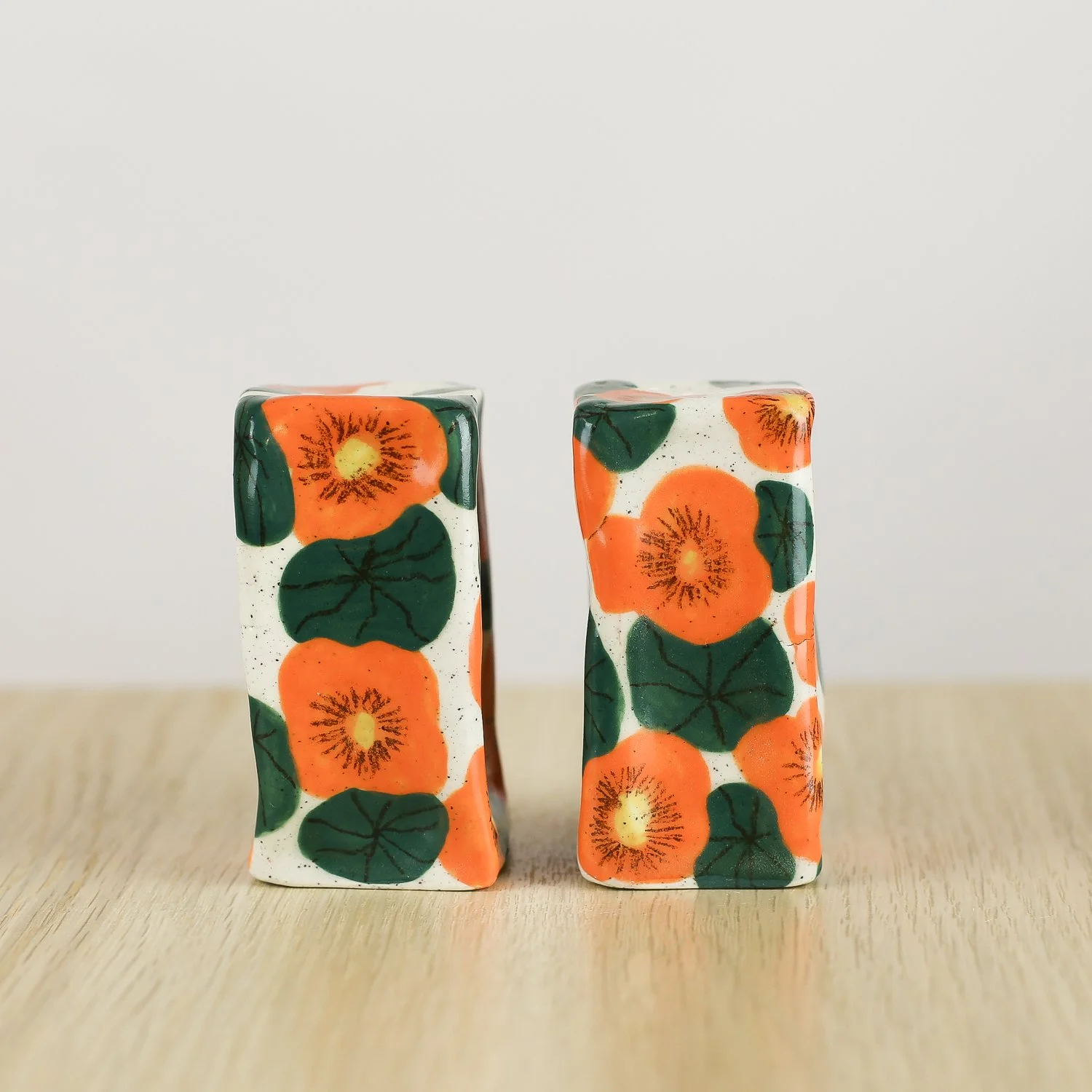 Handmade ceramic salt and pepper shaker set with nasturtium flowers by hellomae