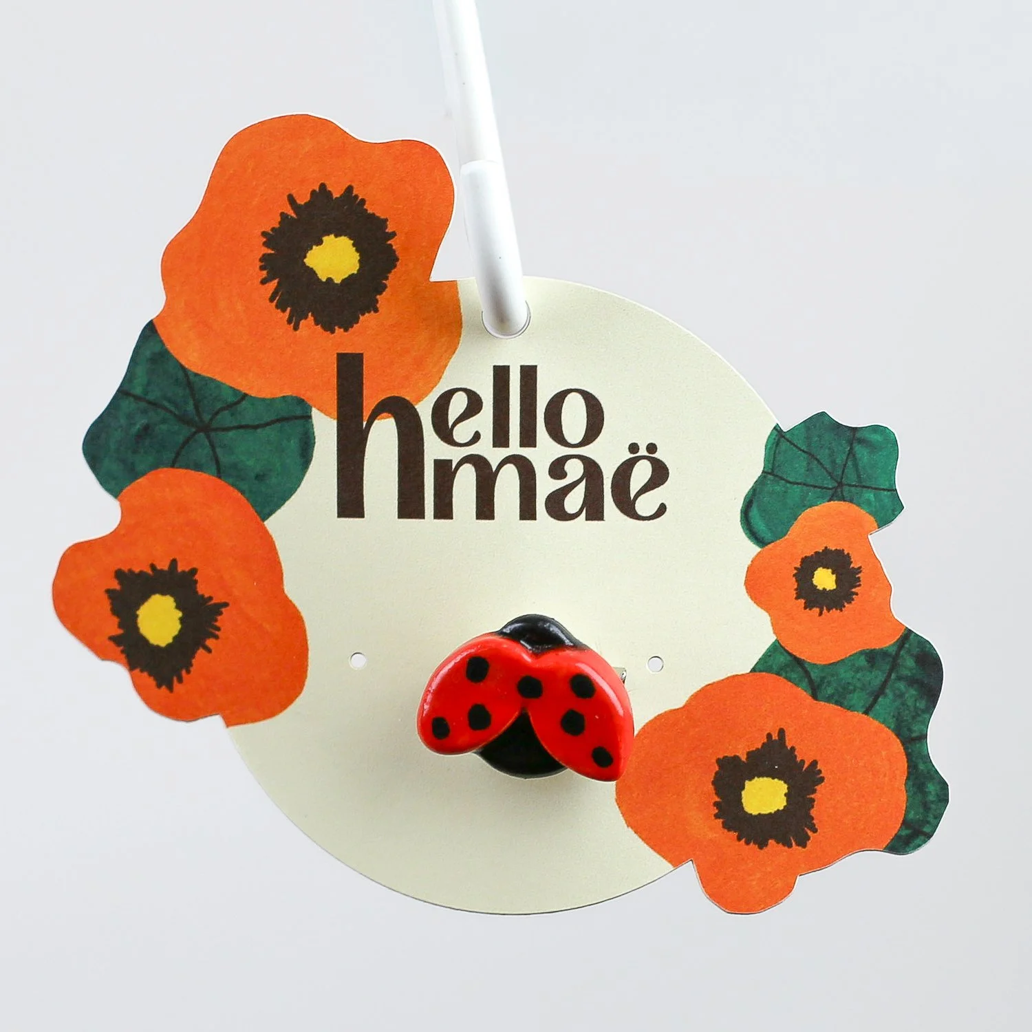 Handmade ceramic ladybug brooch with butterfly clasp backing by hellomae