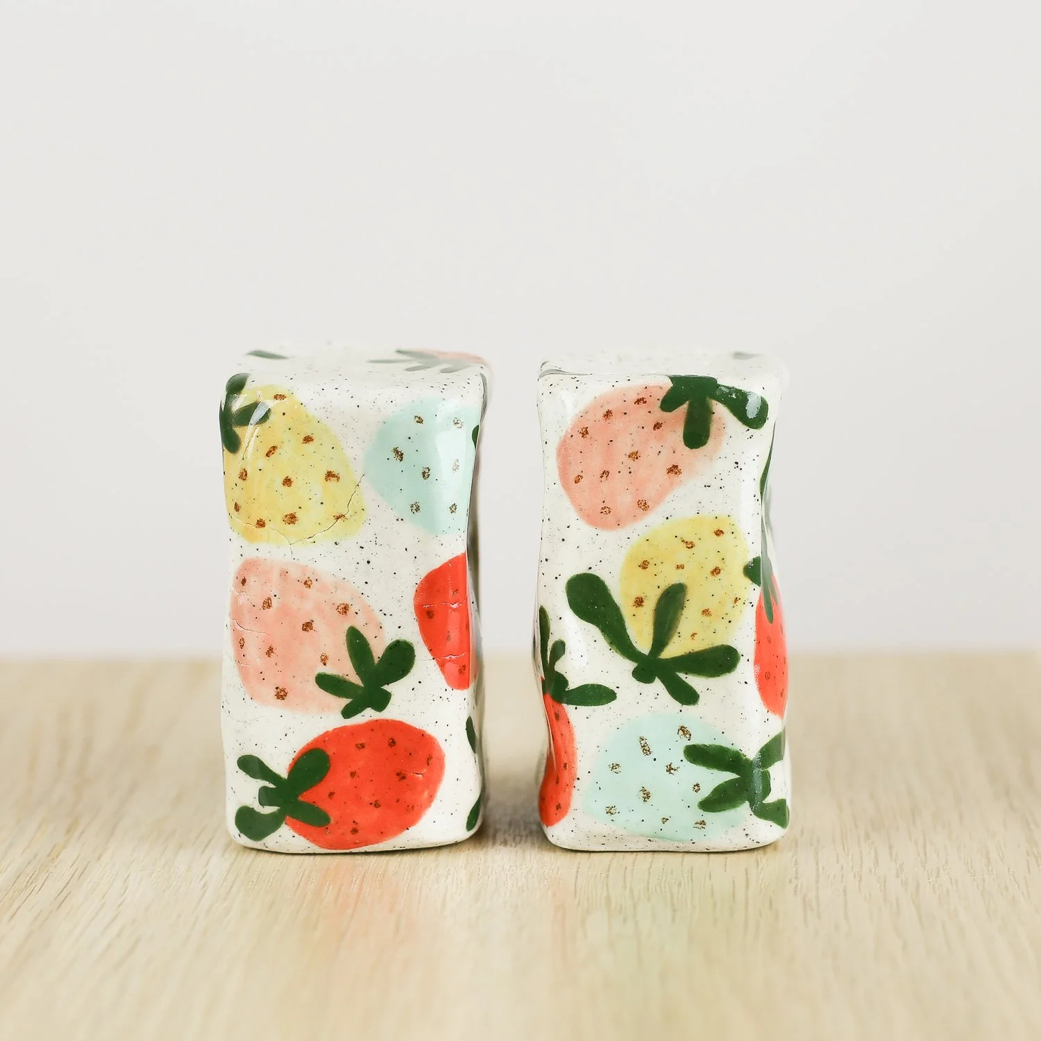 Handmade ceramic salt and pepper shaker set with colourful strawberries by hellomae