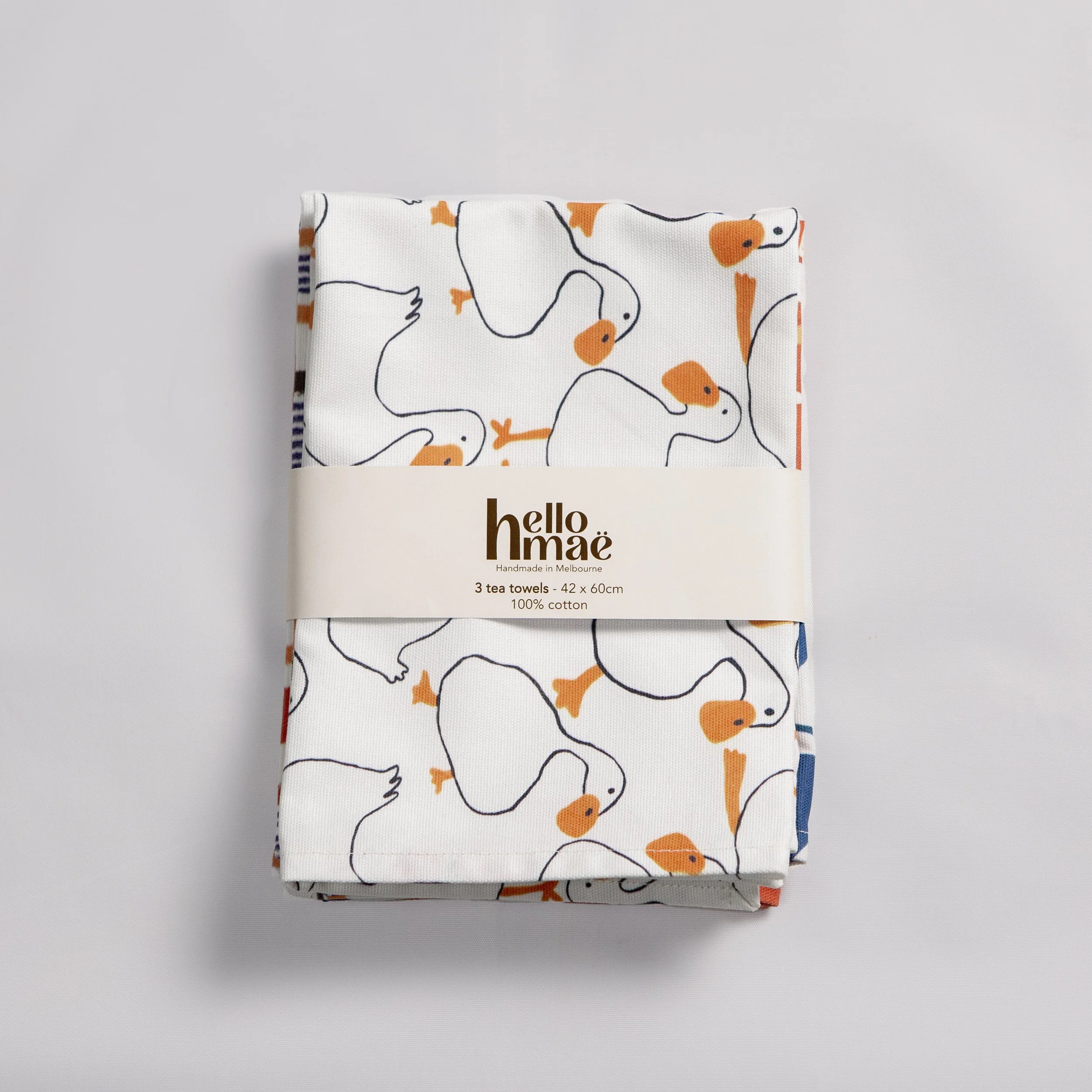 pack of 3 Cotton tea towels featuring a hand-drawn duck, anthurium flower and red/orange/blue/chocolate check print by hellomaë. digitally printed and made in melbourne