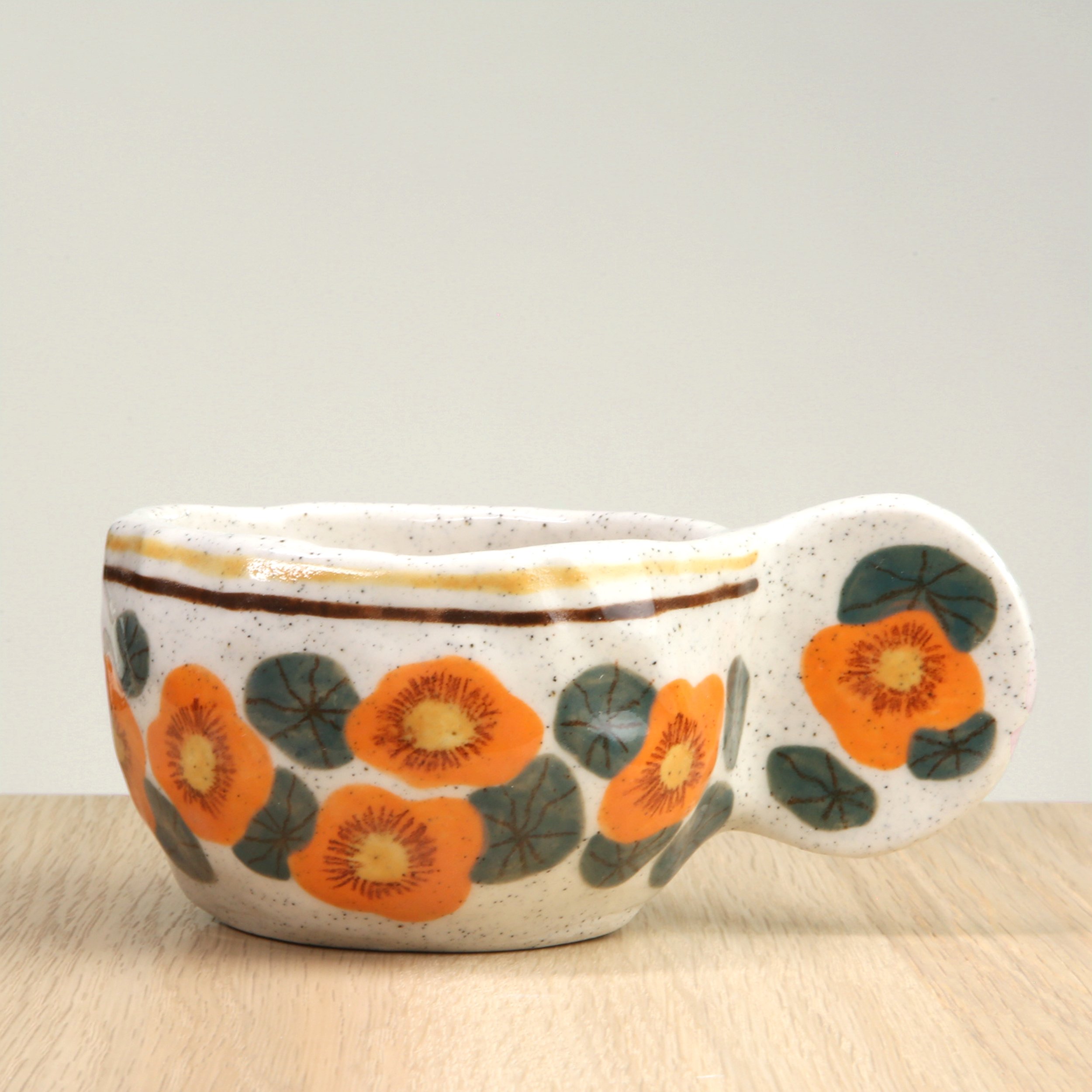 Handmade Ceramic Coffee Cup – Nasturtium flowers & 2 lines border, petal handle