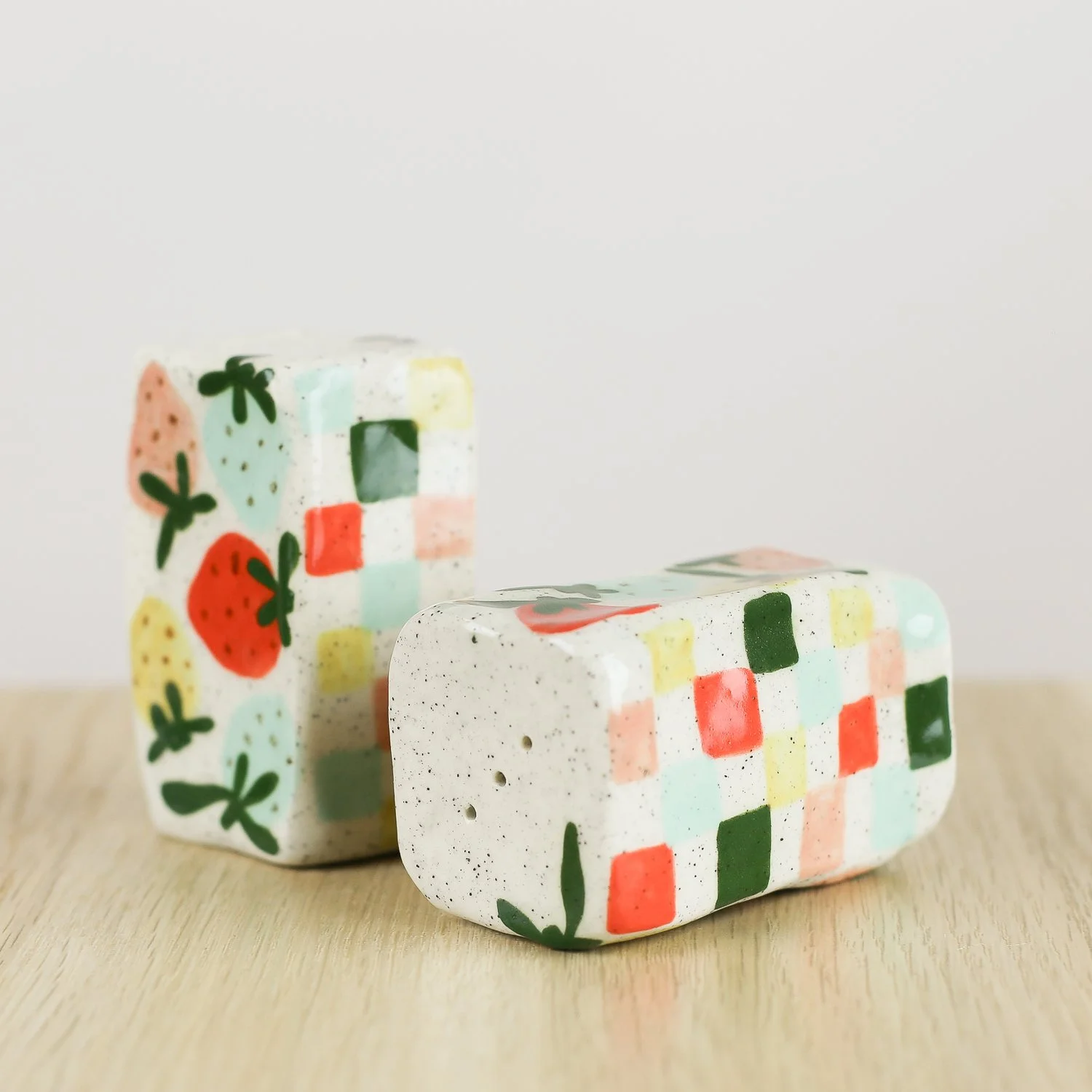 Handmade ceramic salt and pepper shaker set with strawberry and check pattern by hellomae