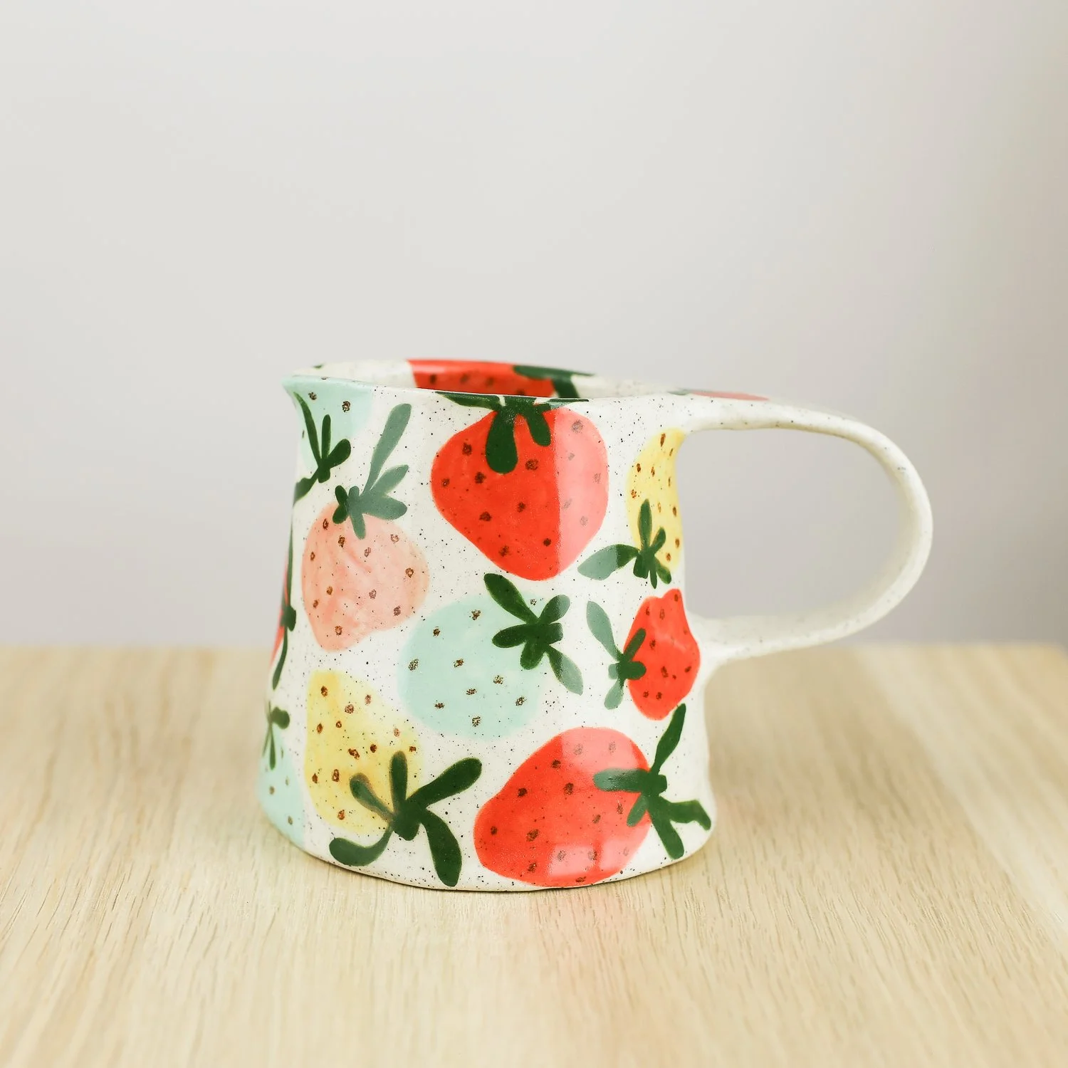 Handmade ceramic jug with colourful strawberries, 350ml milk jug by hellomae