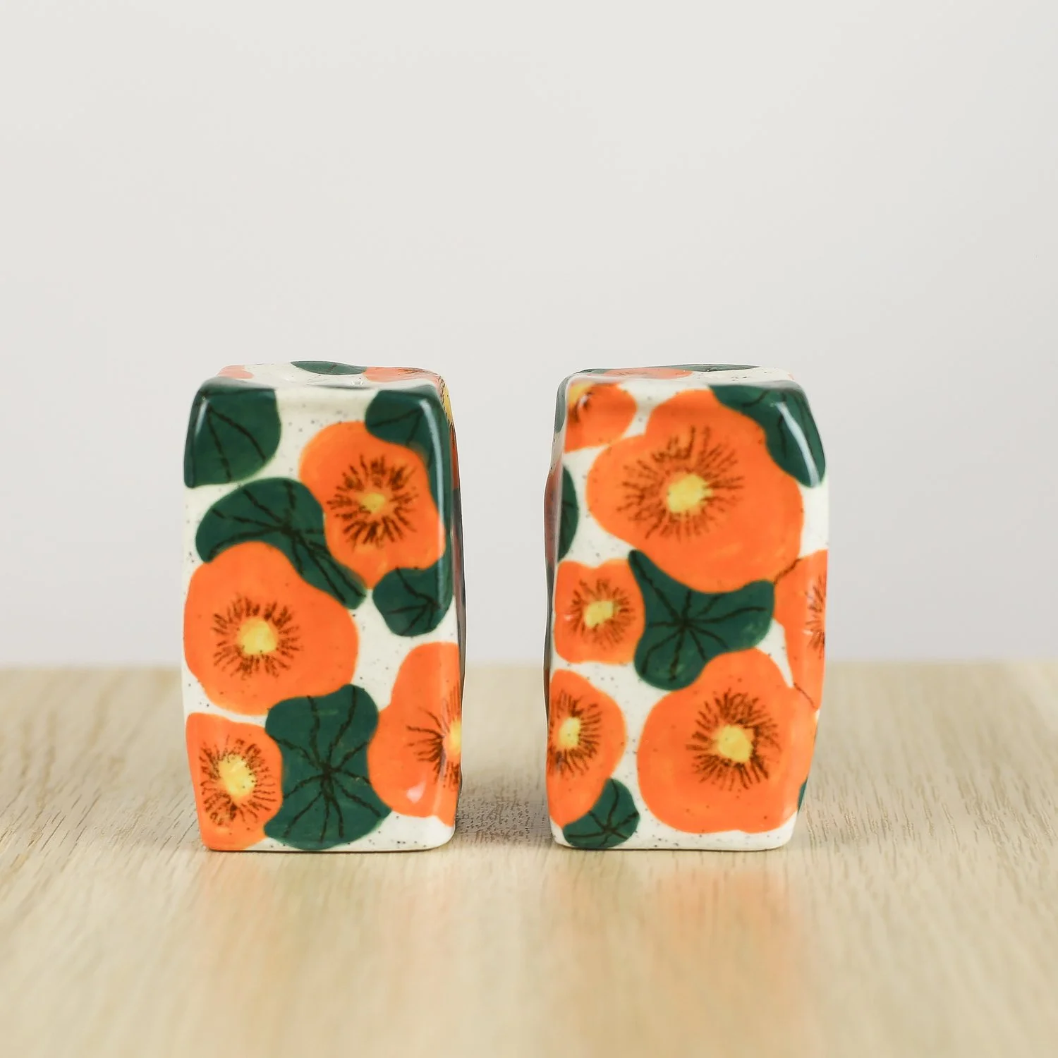 Handmade ceramic salt and pepper shaker set with nasturtium flowers by hellomae