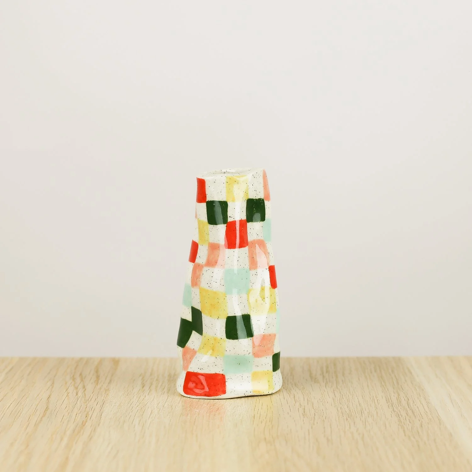 Handmade ceramic mini vase with colourful check pattern in red pink yellow and blue, bud vase by hellomae