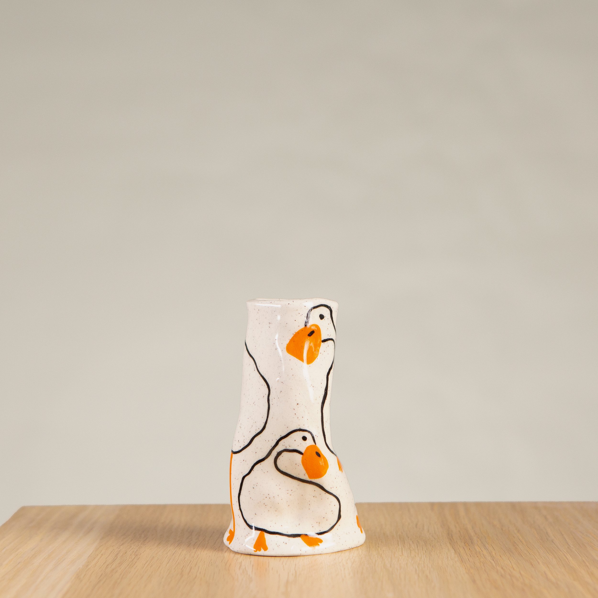 Mini ceramic vase with hand-painted white ducks artwork on speckled clay, handmade in Melbourne by hellomaë