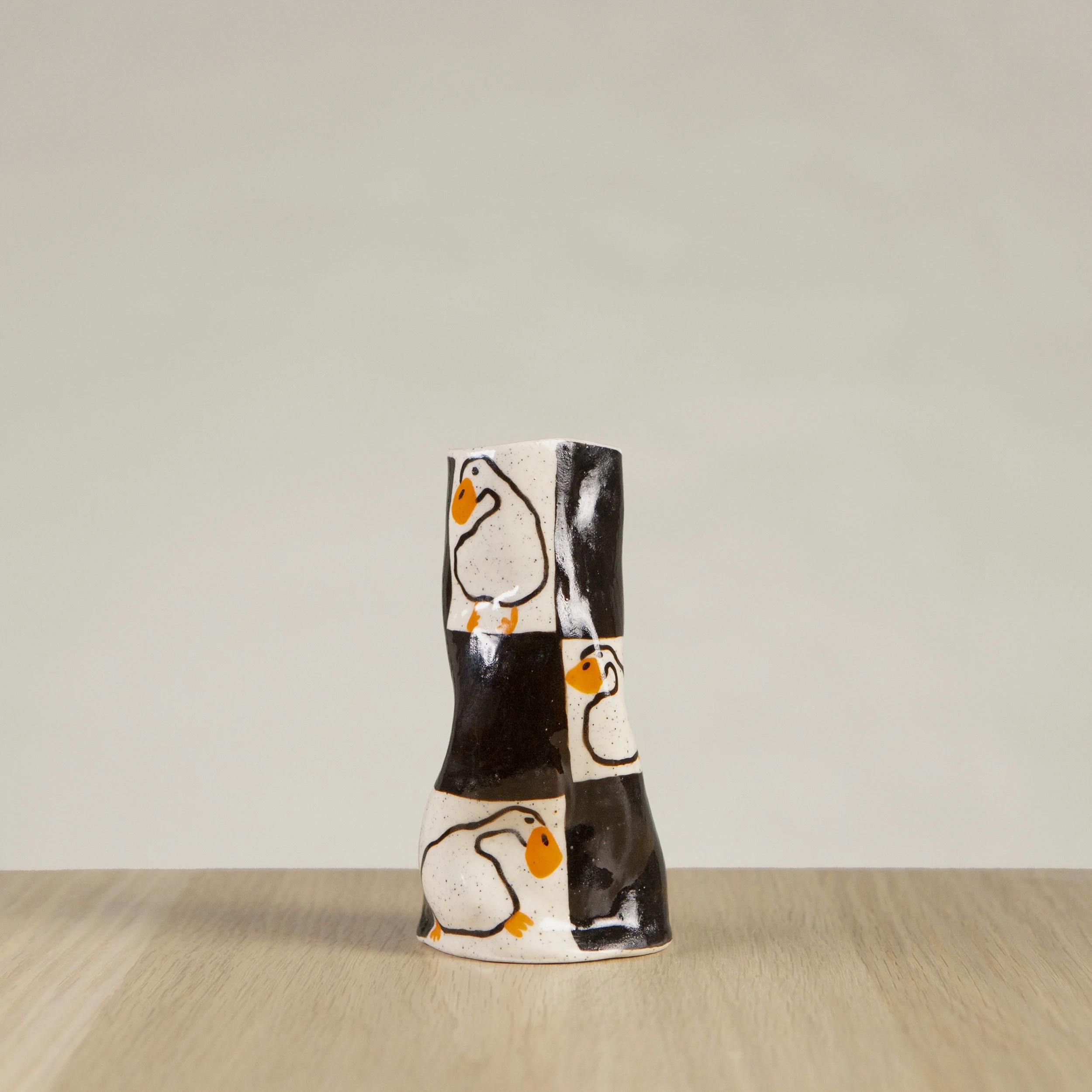 Mini ceramic vase with hand-painted white ducks, black check and love hearts artwork on speckled clay, handmade in Melbourne by hellomaë