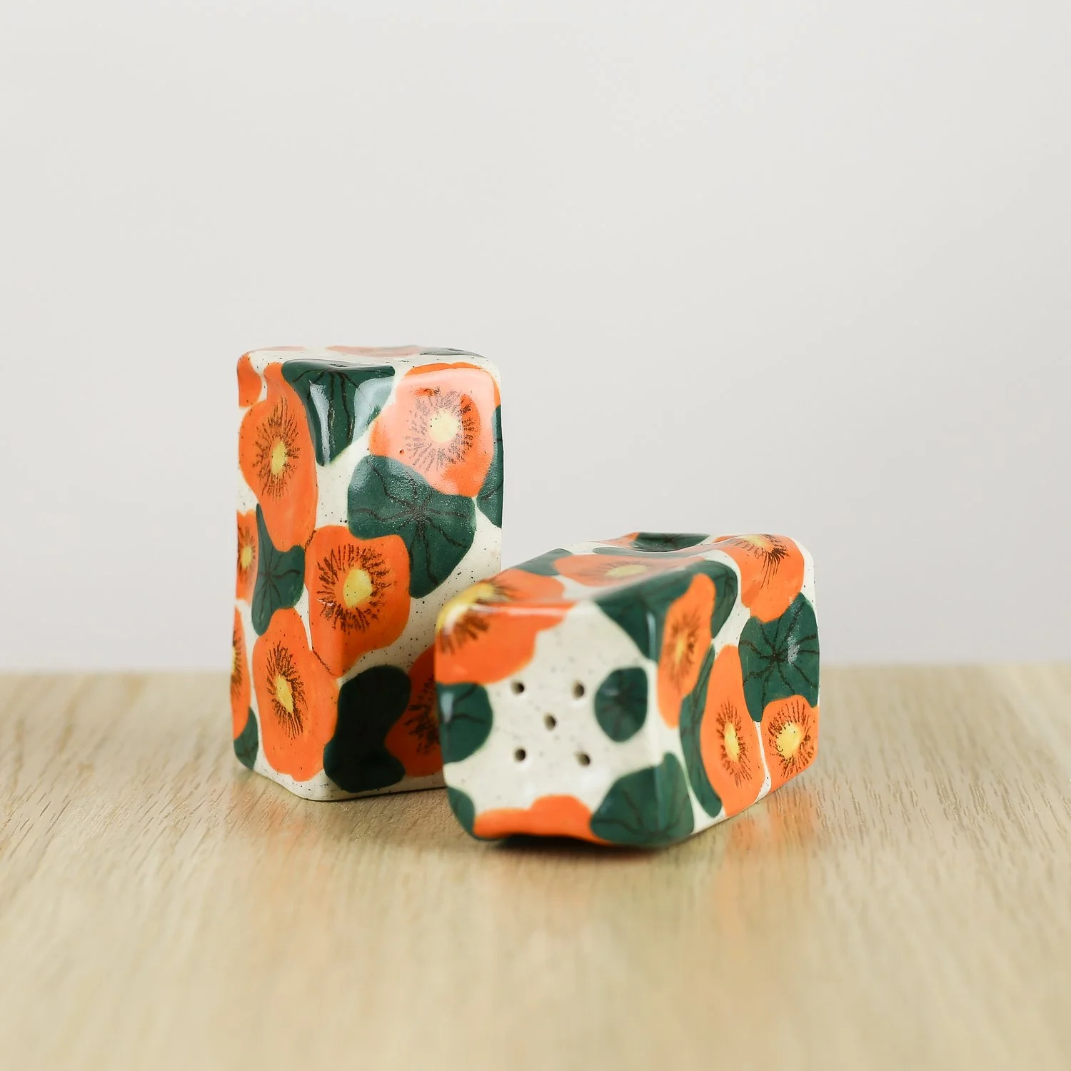 Handmade ceramic salt and pepper shaker set with nasturtium flowers by hellomae