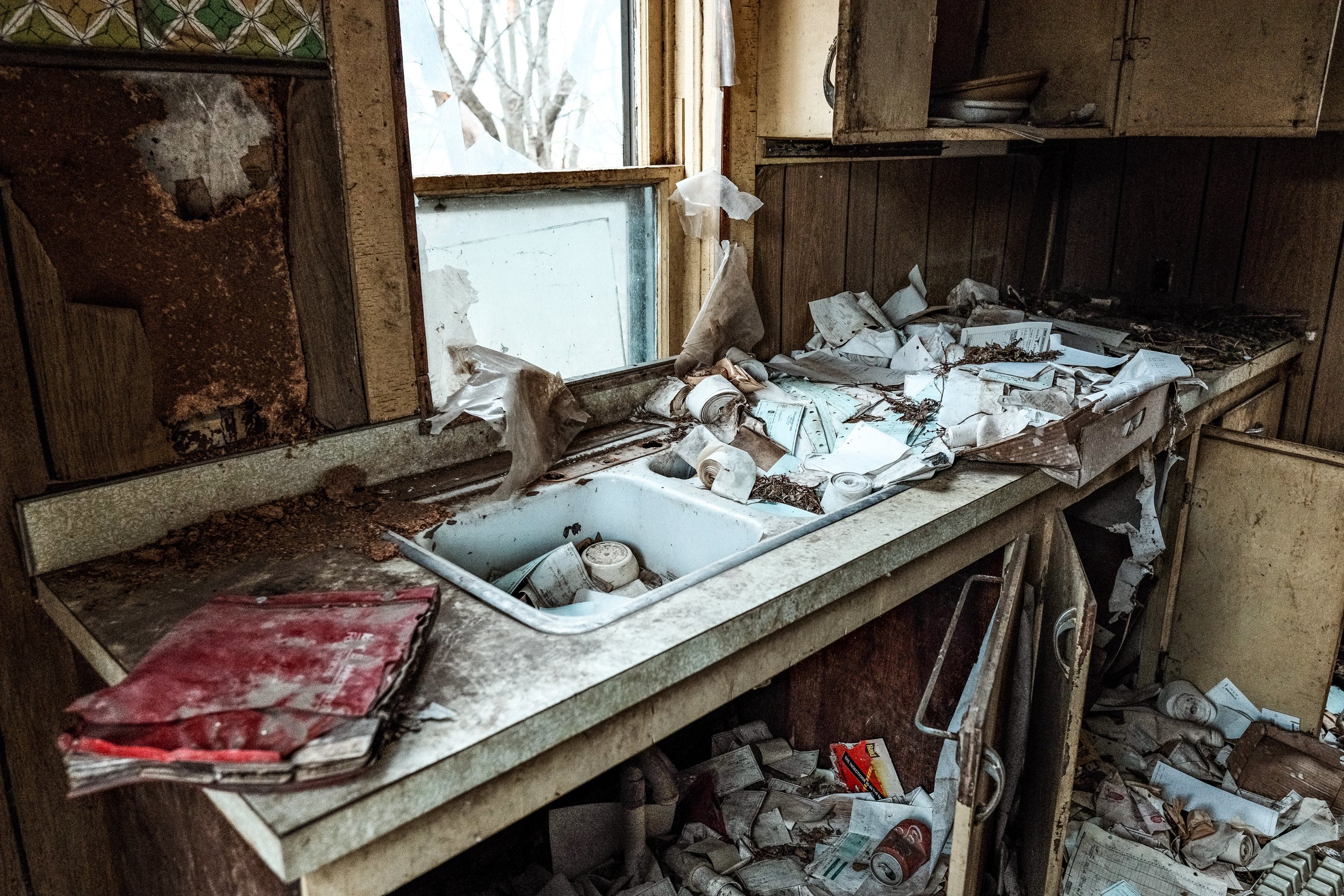 Checks, Financial Records and Adding Machine Tapes inside of The "Little Hooker Cafe and Bait shop." Closed in 2011.