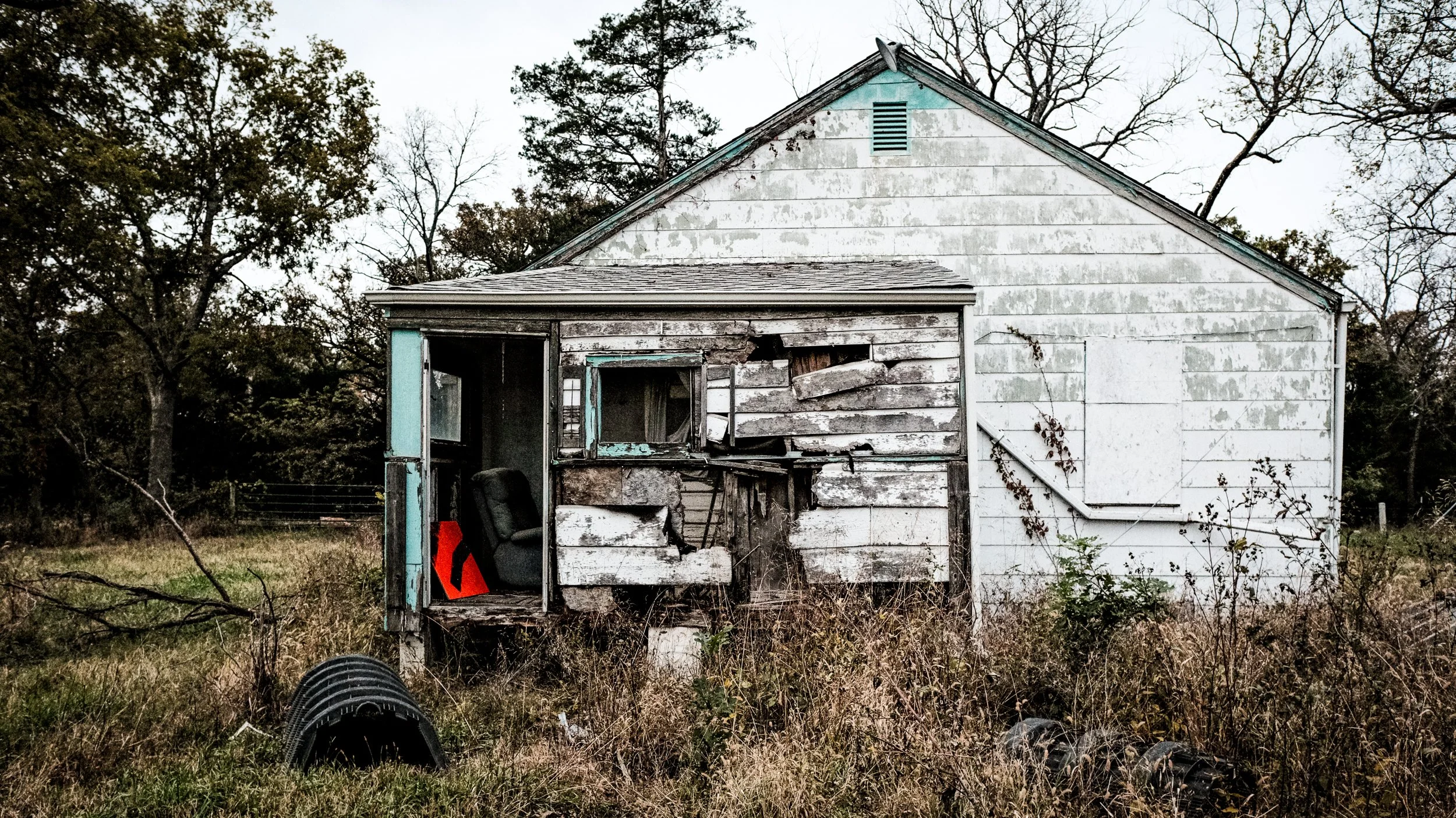 Decaying and Abandoned Home off a Small Country Road.