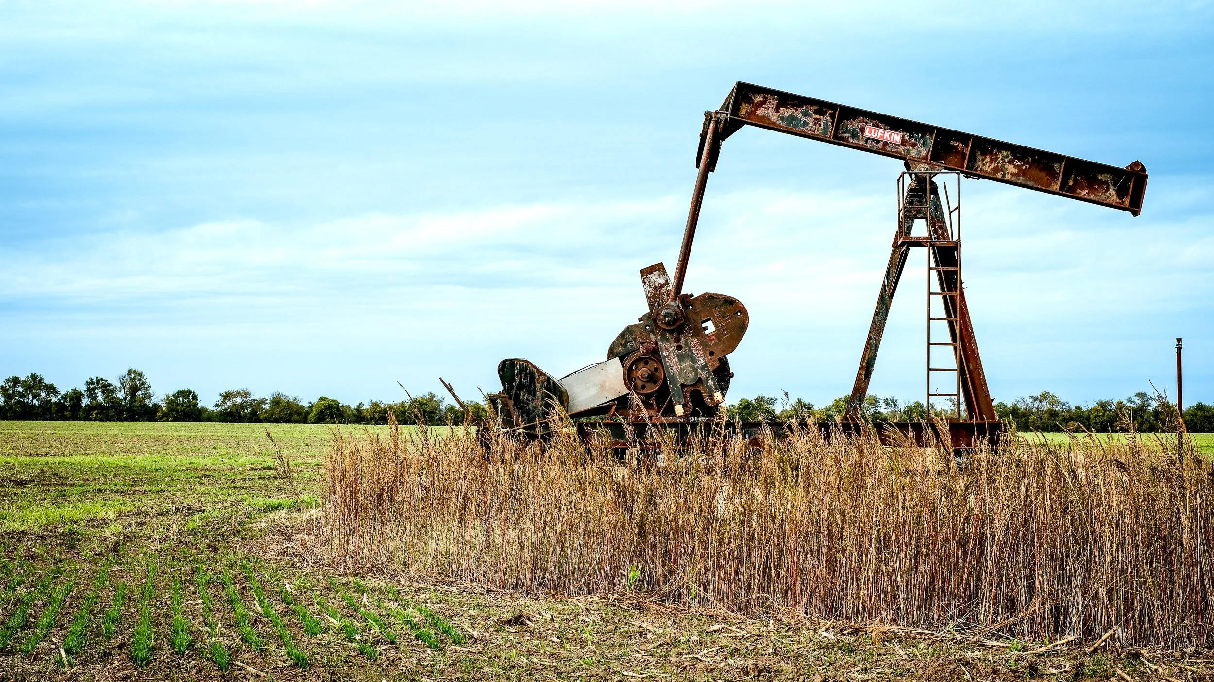 Abandoned and Decaying Oil Pump on a Kansas Farm.