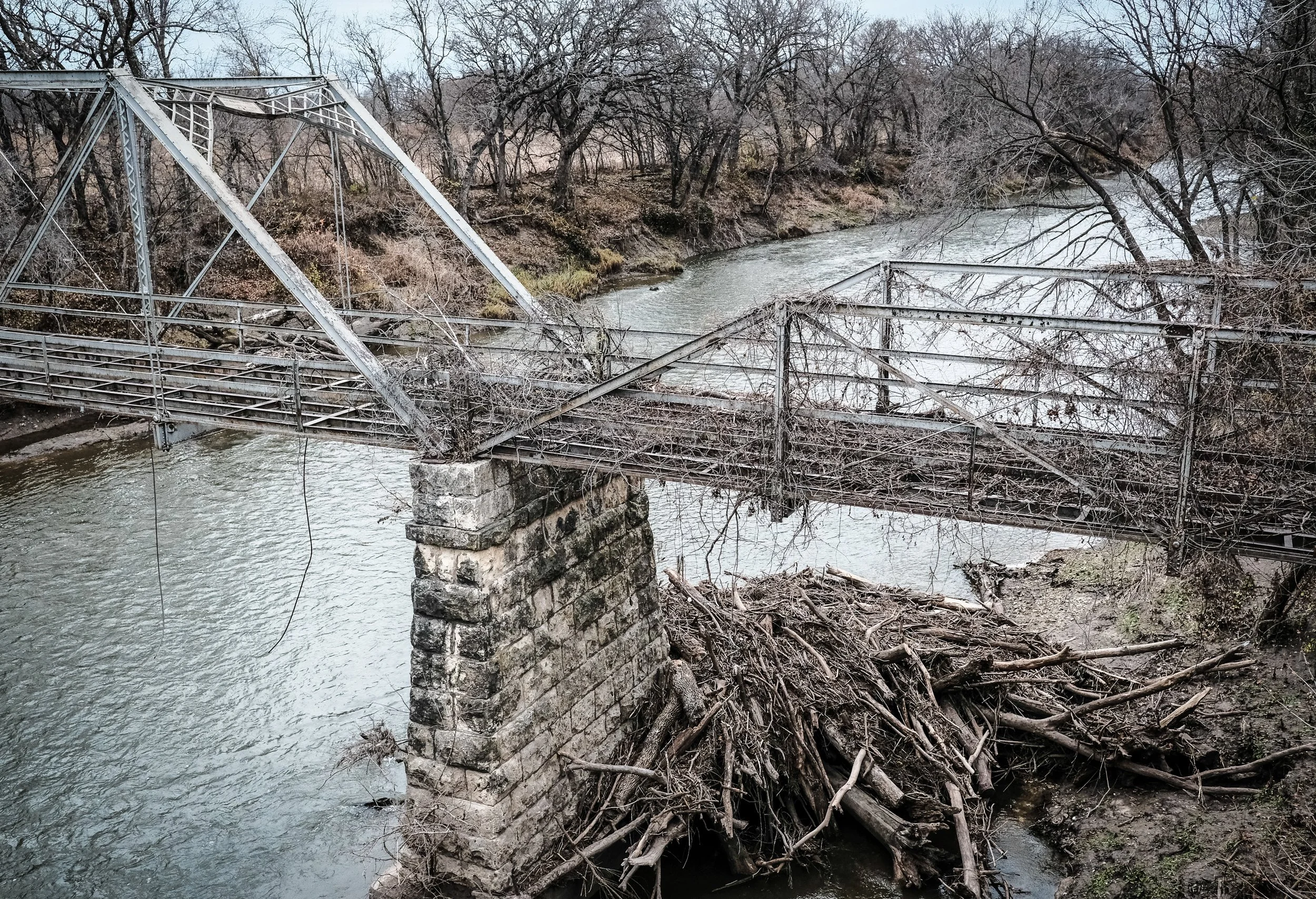 Log Jam and Abandoned Bridge over the Walnut River. 