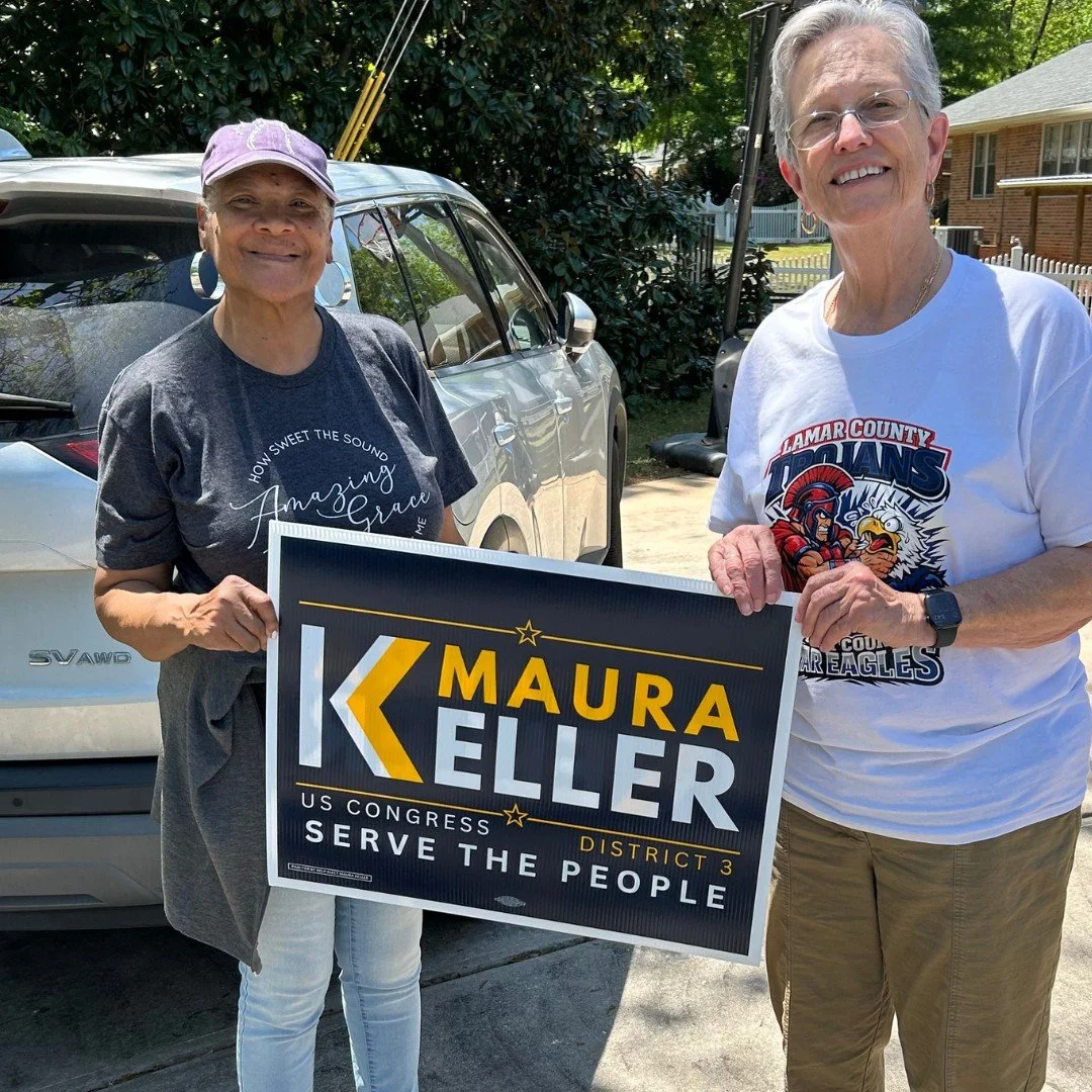 Maura Keller for Congress supporter with yard sign