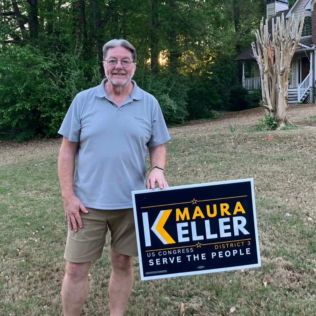 Maura Keller for Congress supporter with yard sign