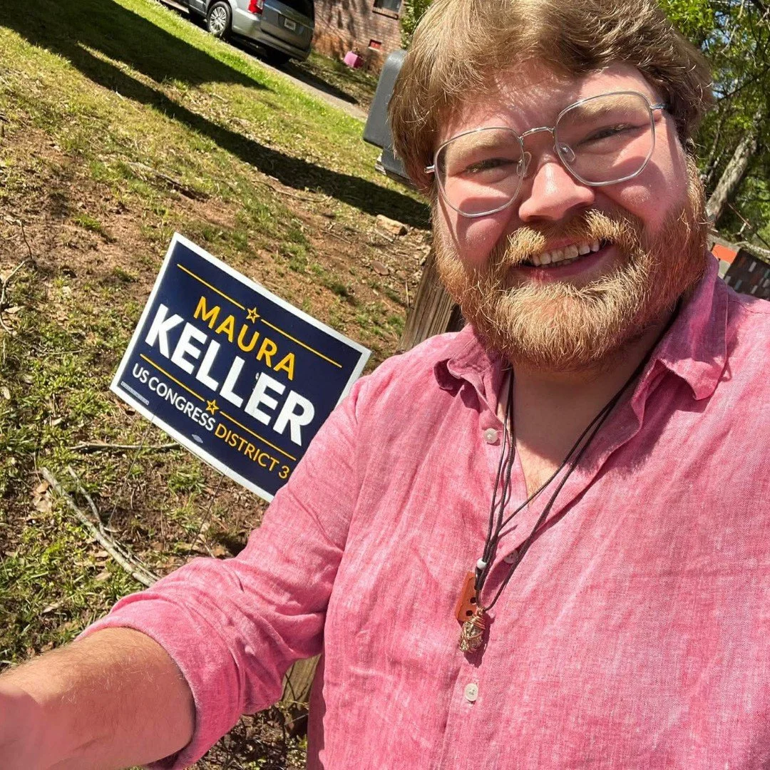 Maura Keller for Congress supporter with yard sign