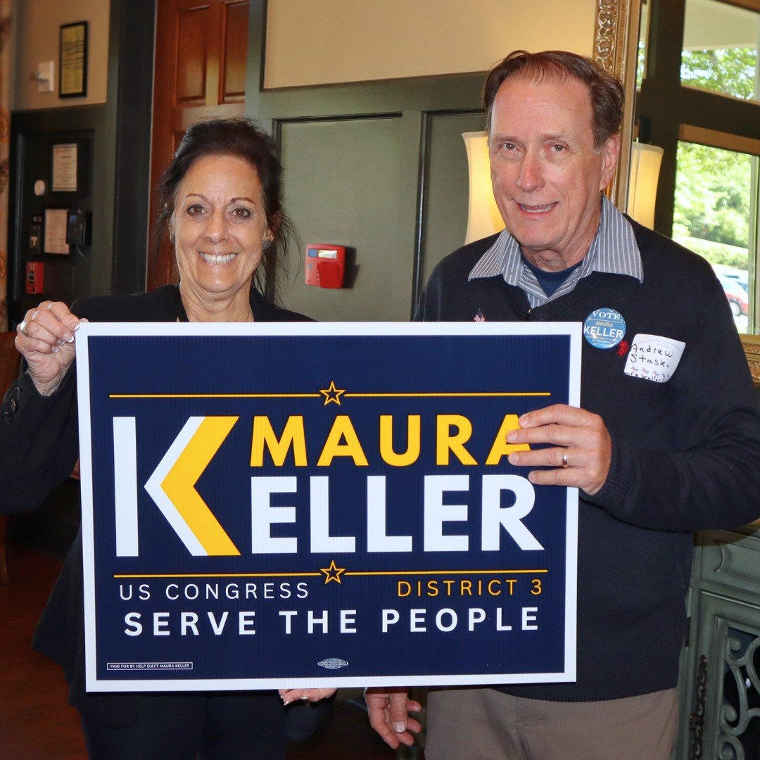 Maura Keller for Congress supporter with yard sign