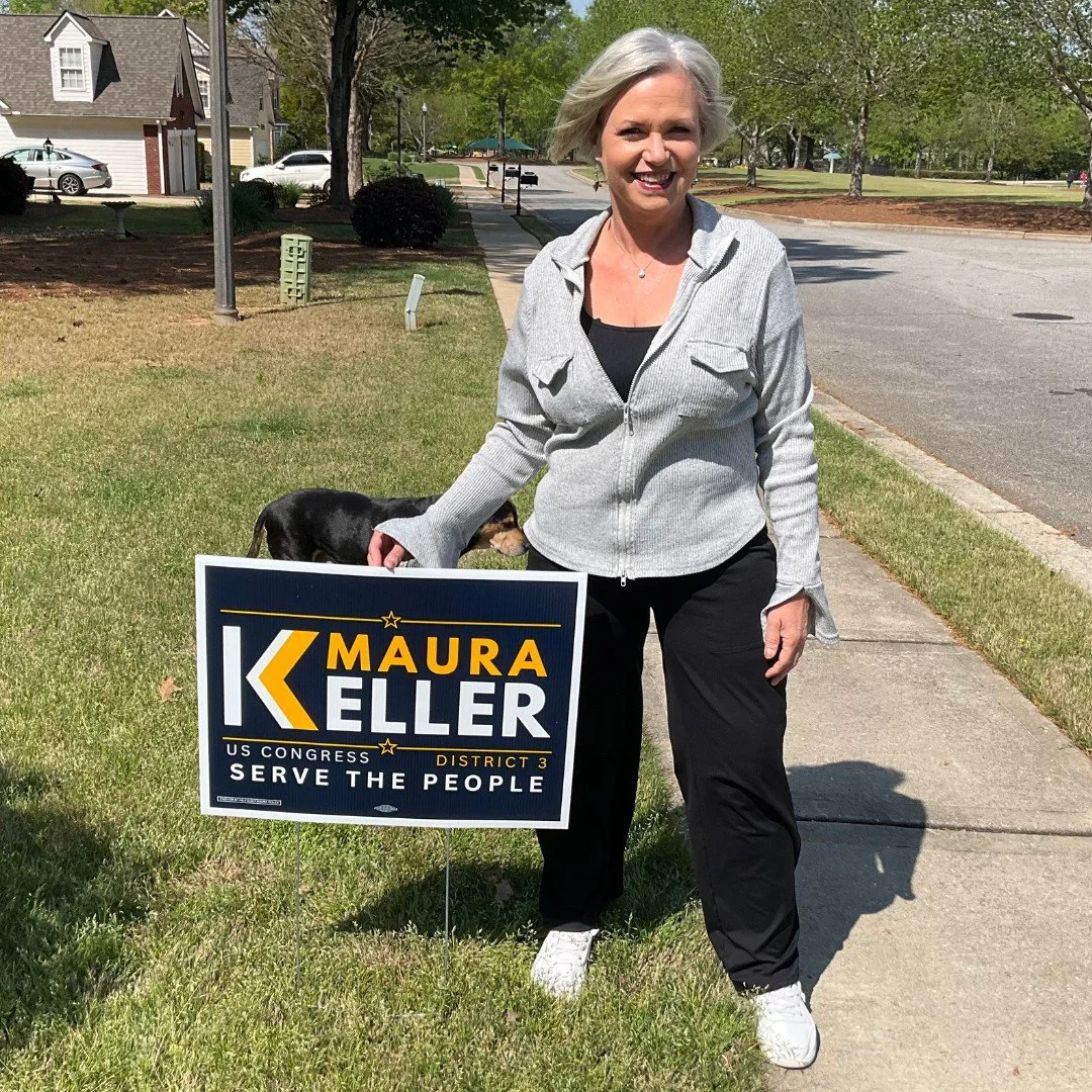 Maura Keller for Congress supporter with yard sign