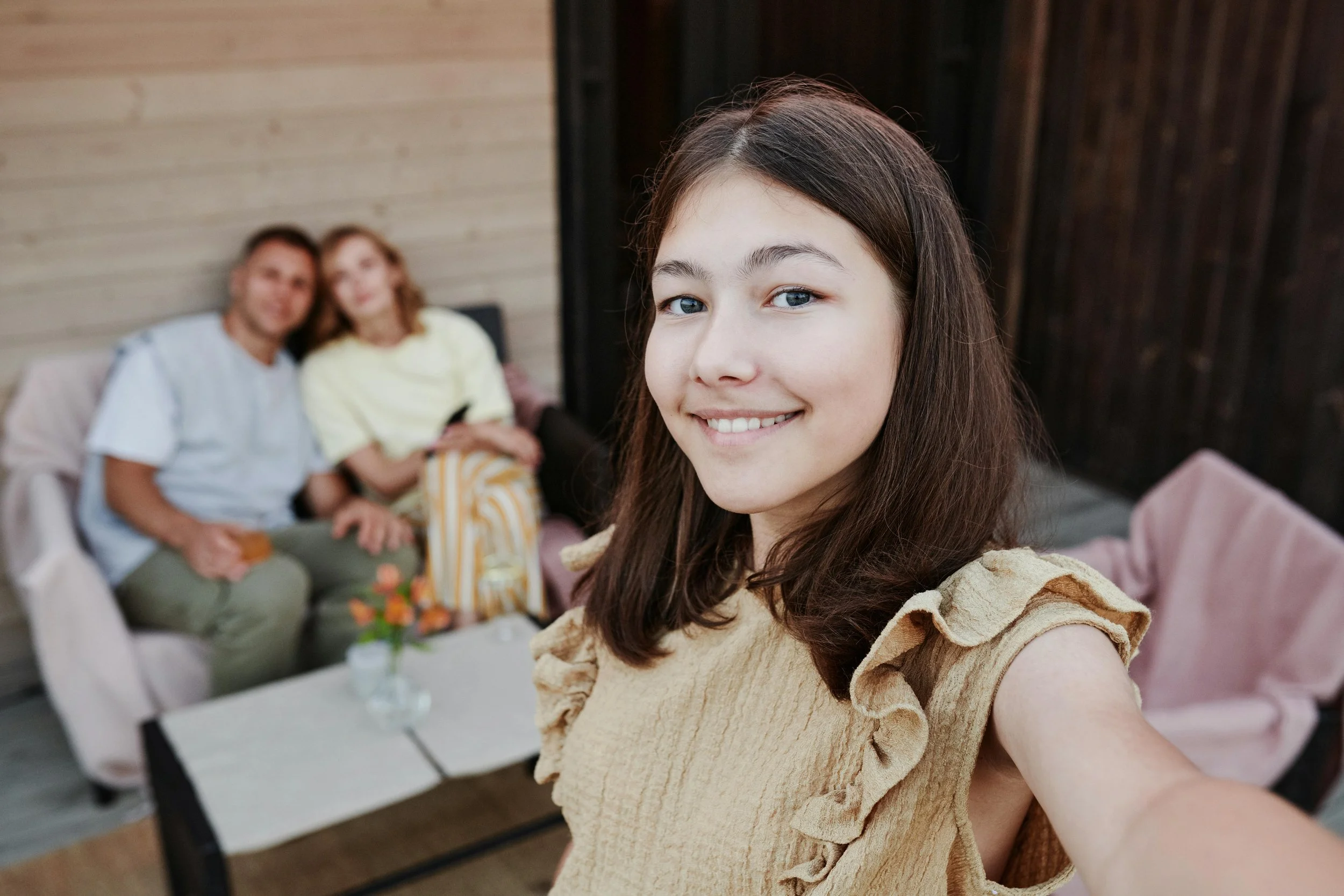 A family sits together on the floor by bright windows. Is it possible to prioritize supporting your child's mental health without losing yourselves as partners? Couples therapy in Arcadia, CA, teaches balanced approaches to both relationships.