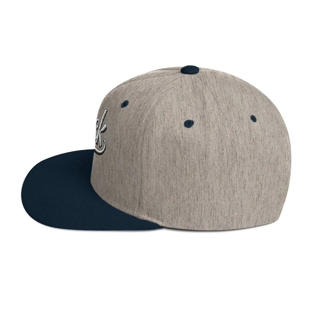 classic-snapback-heather-grey-navy-left-side-68a75180e13bf.jpg