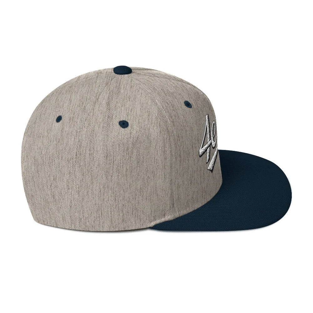 classic-snapback-heather-grey-navy-right-side-68a75180e1c14.jpg