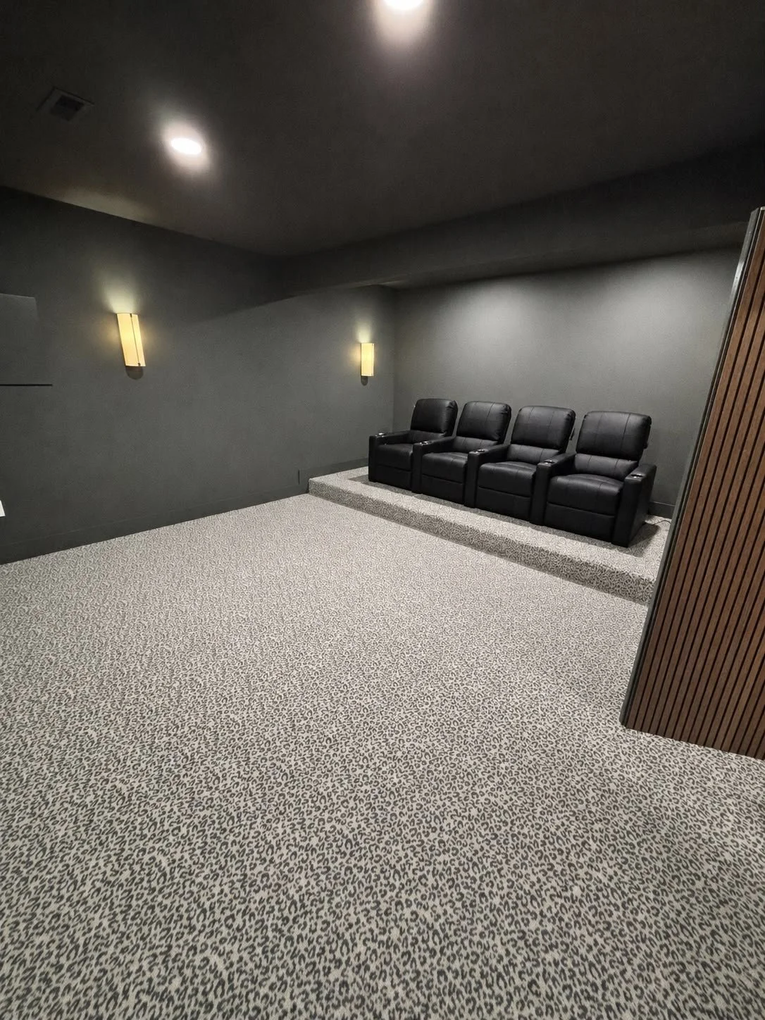 Experience cinema-quality comfort in the heart of your home. With custom design elements, ambient lighting, premium finishes, and a layout tailored for entertainment, this theater-style living room creates the perfect space to relax, watch, and enjoy