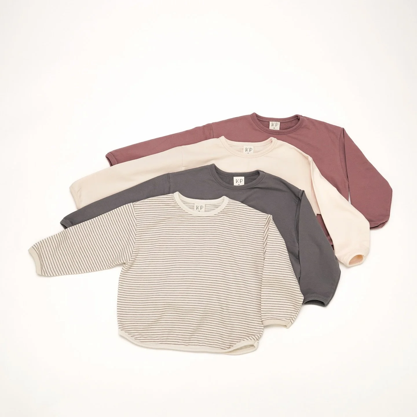 Effortless, comfy, and made to layer. Our long sleeve crew neck shirt keeps them cozy without the bulk. Layer under or over, it&rsquo;s the sweatshirt you&rsquo;ll reach for again and again. 🤍

#khakiandpink #newcollection #layeringclothing