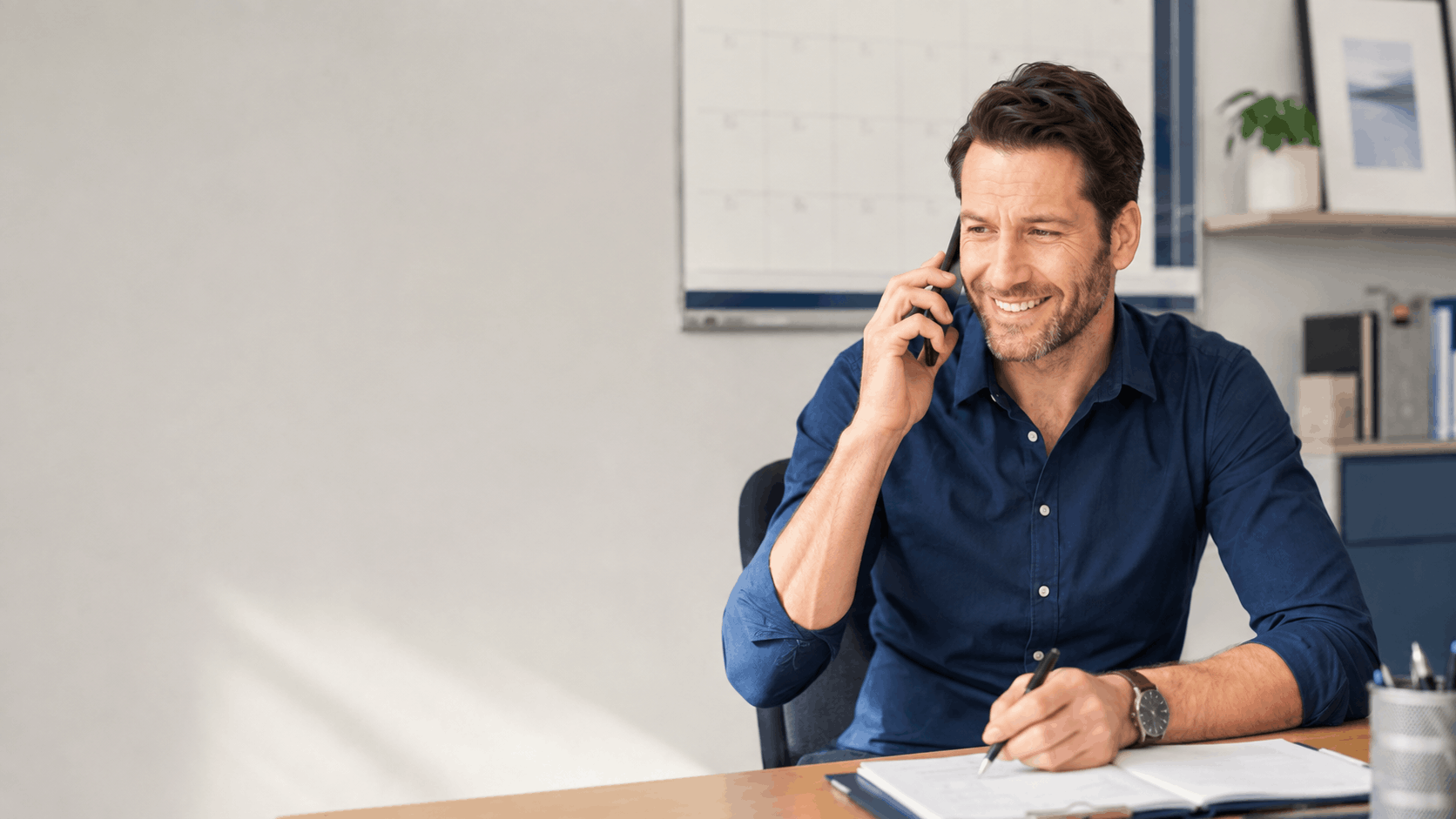 Happy Local business owner getting calls from clients