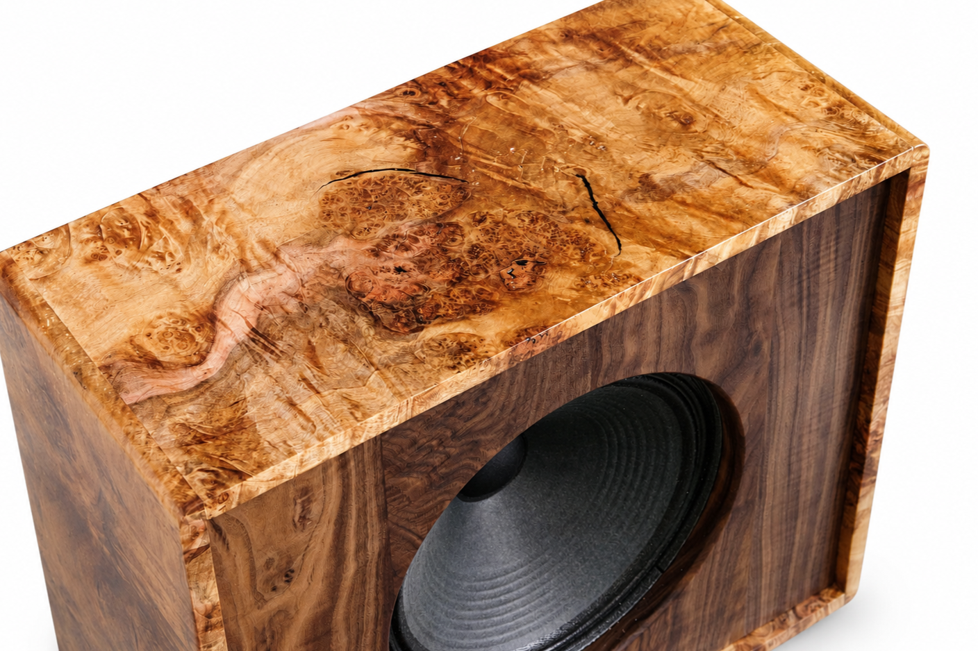 A wooden speaker with a glossy, polished wood finish and a black speaker cone inside.