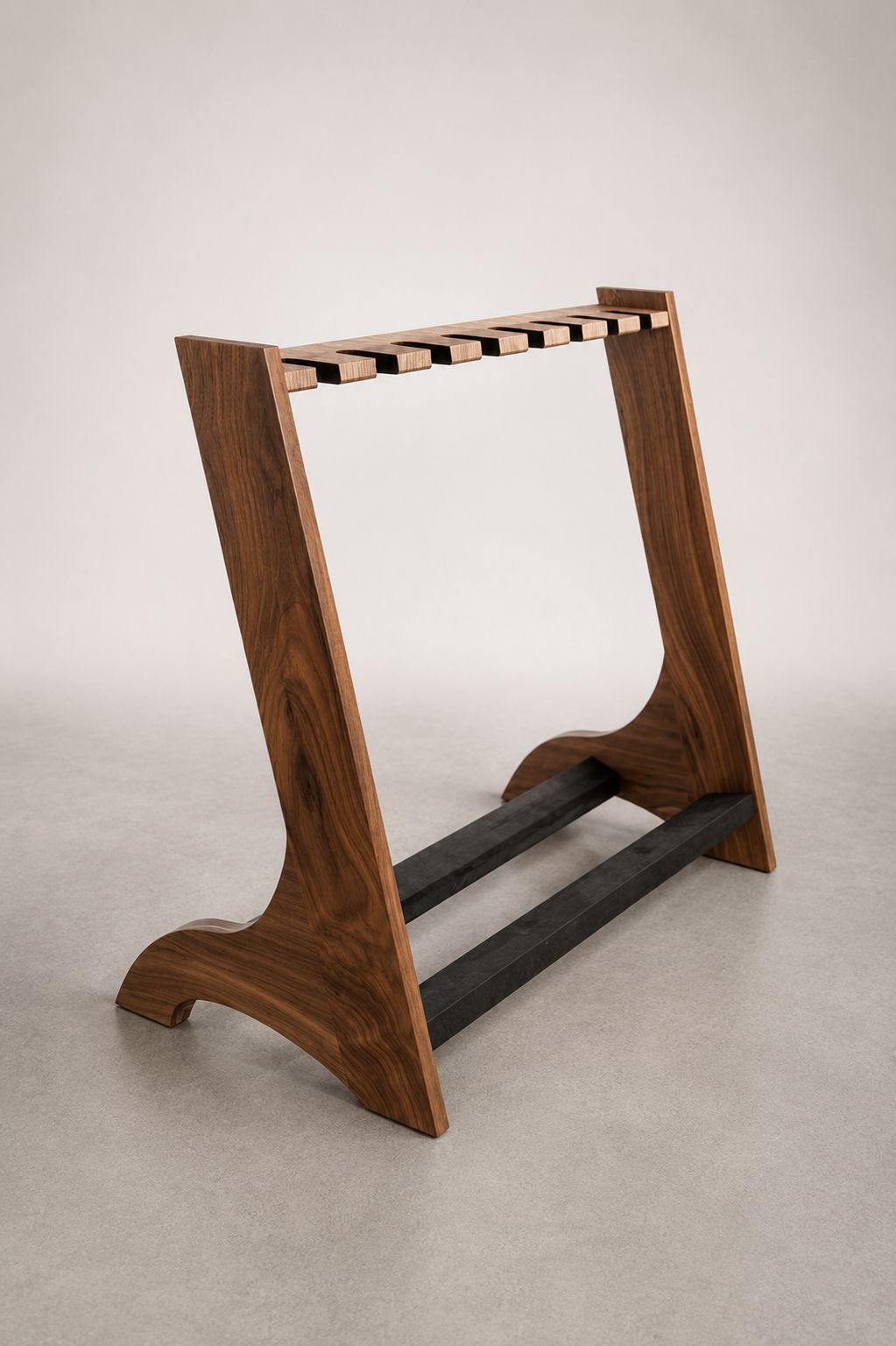 A wooden stand with black horizontal bars, likely used as a towel or clothing rack.