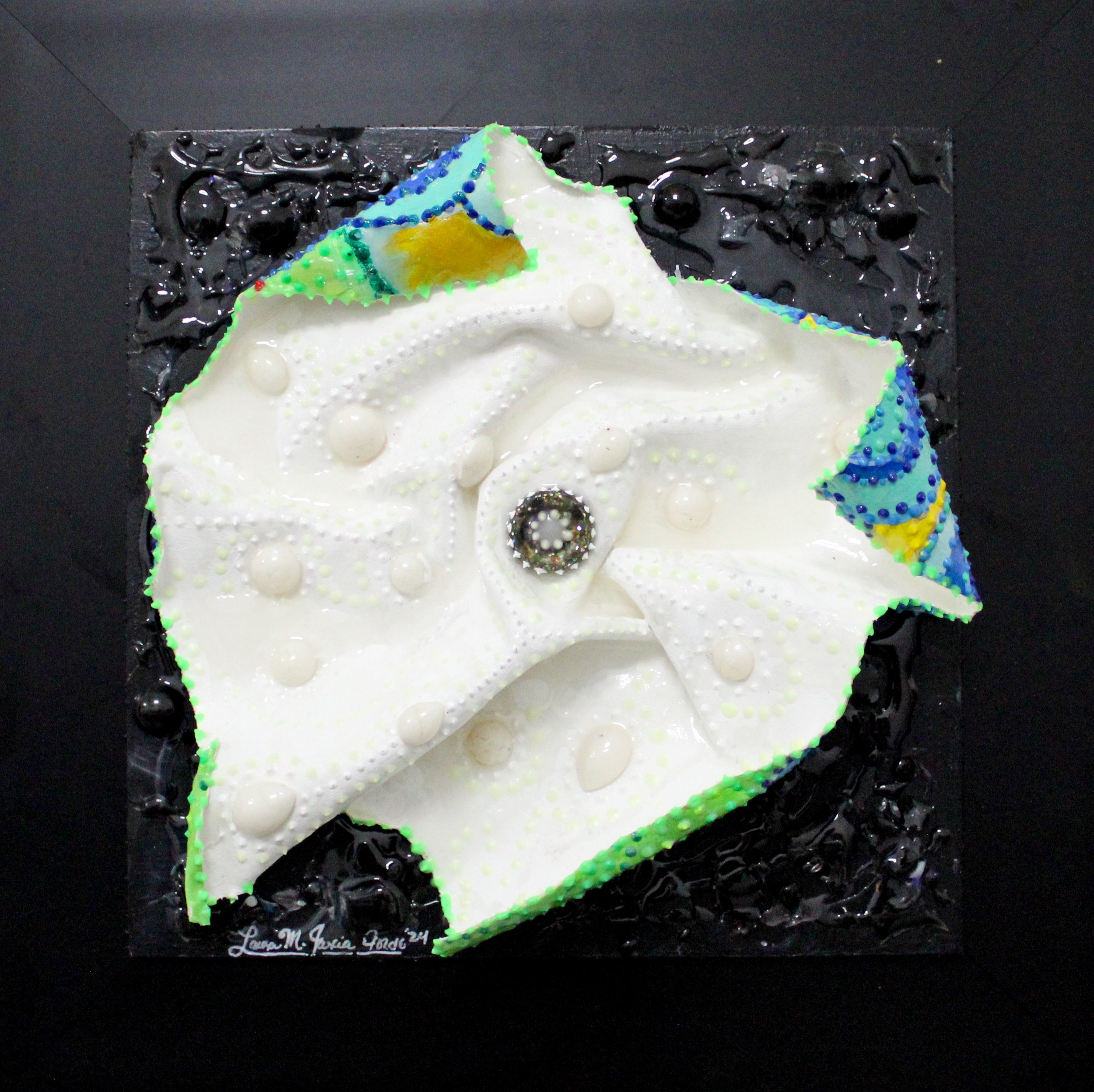 “White textured mixed media abstract artwork with sculptural folded form and central gem-like element on a black background.”
