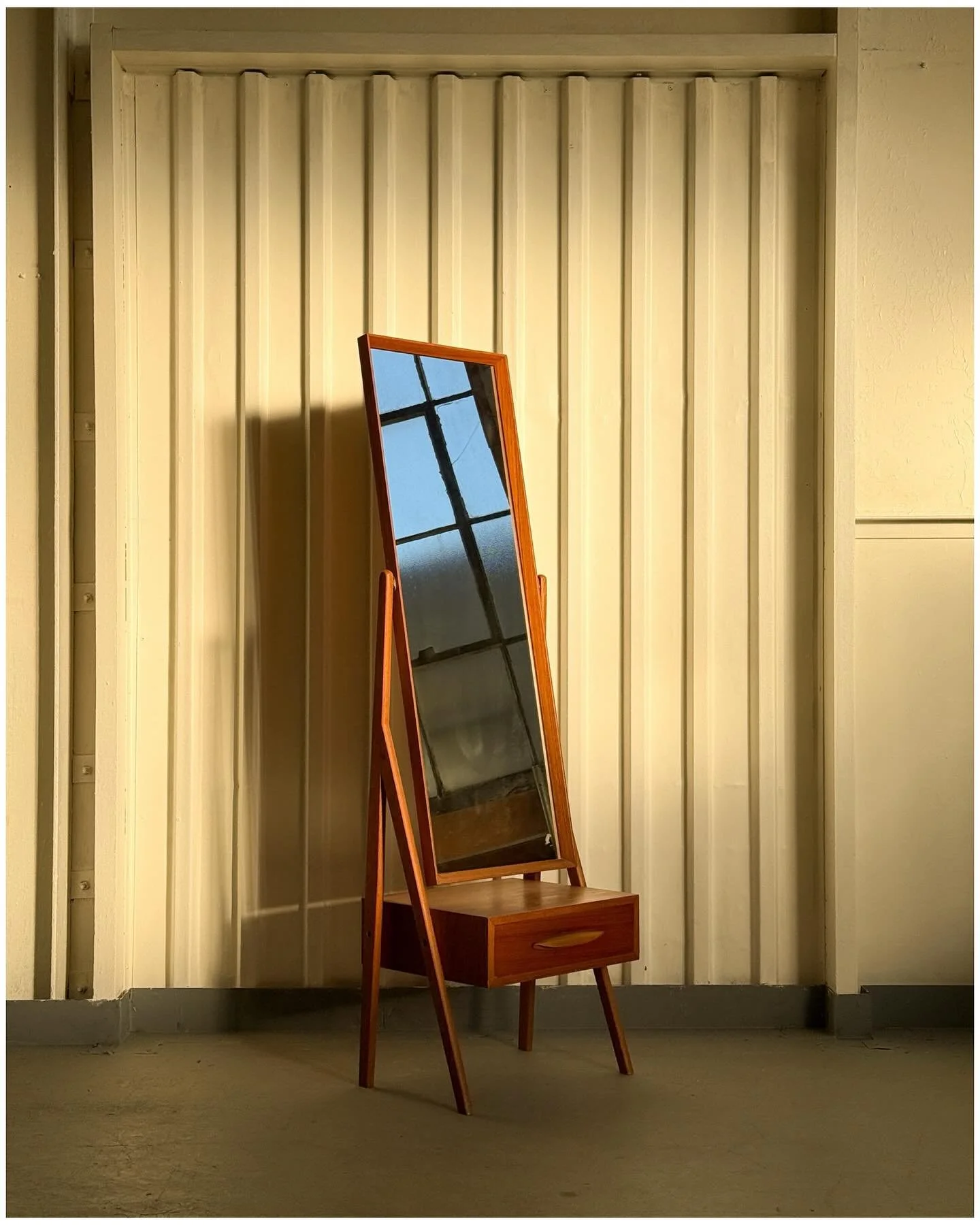 Danish Cheval Mirror with Drawer c.1960s

Solid teak structure and mitered mirror frame.