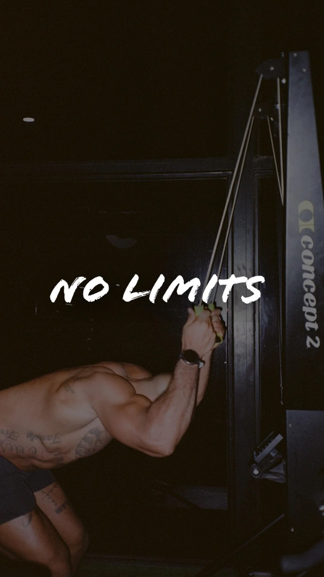 A shirtless man with tattoos working out with a rope machine, with the words 'NO LIMITS' overlayed on the image.