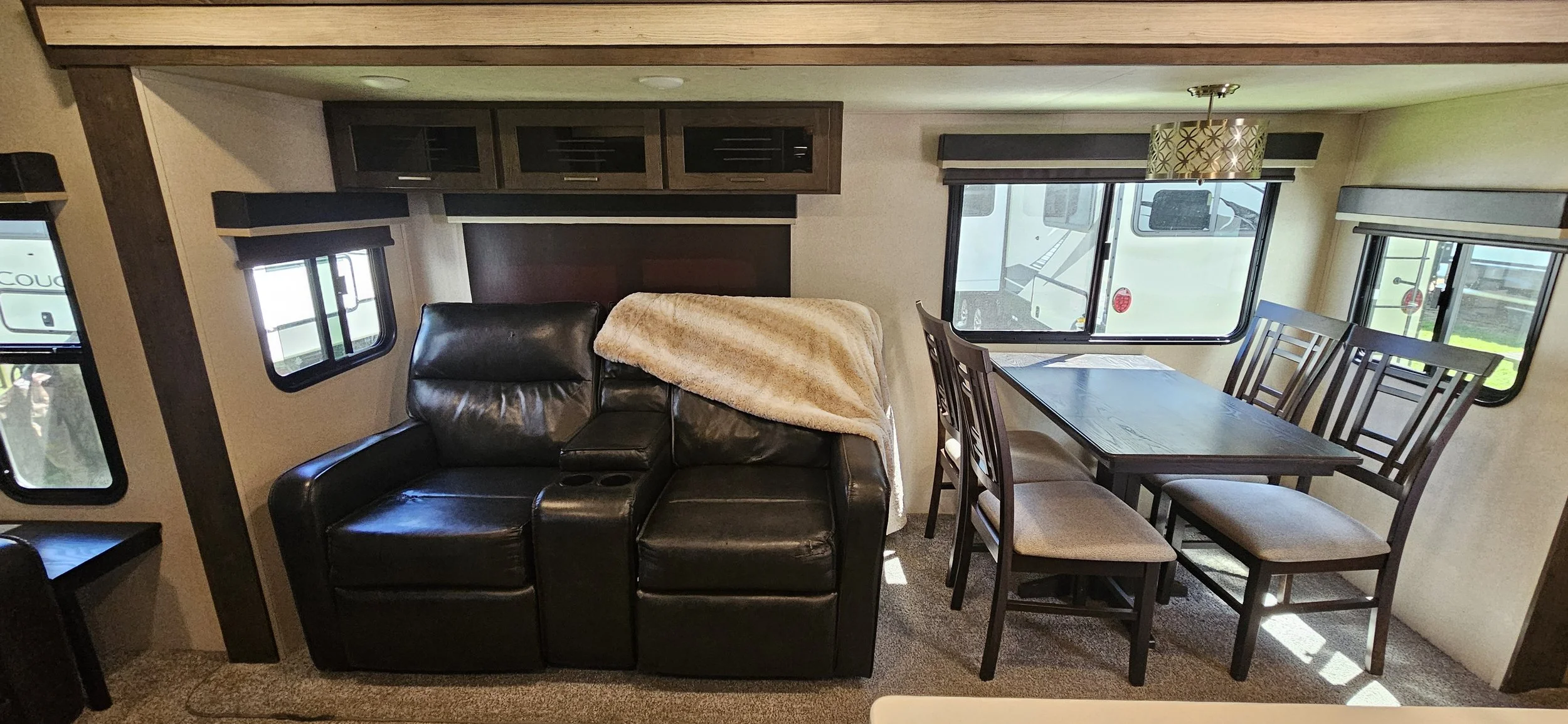Heritage Glen LTZ RV interior - recliner, table