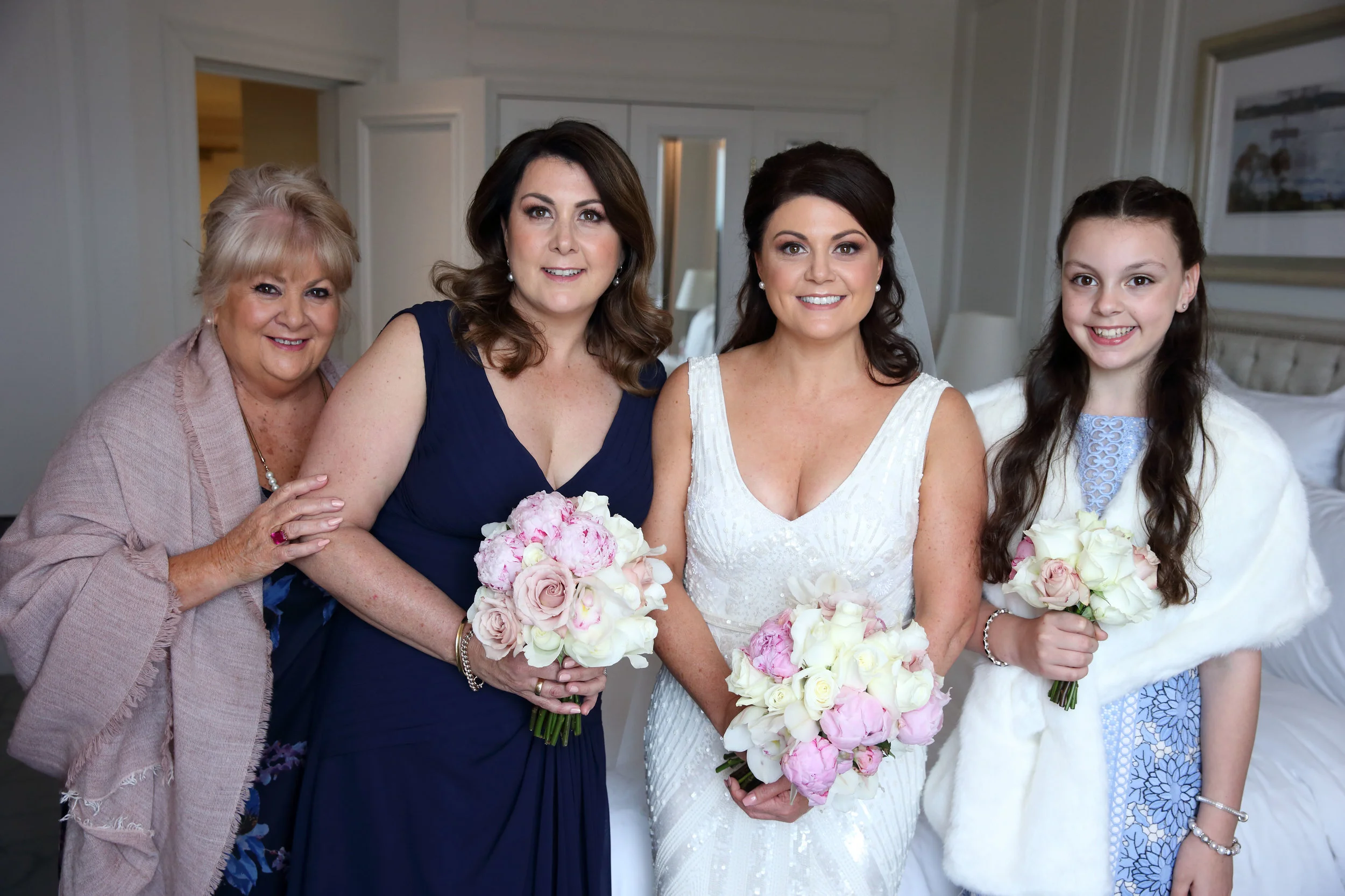 Bride and bridesmaids getting ready