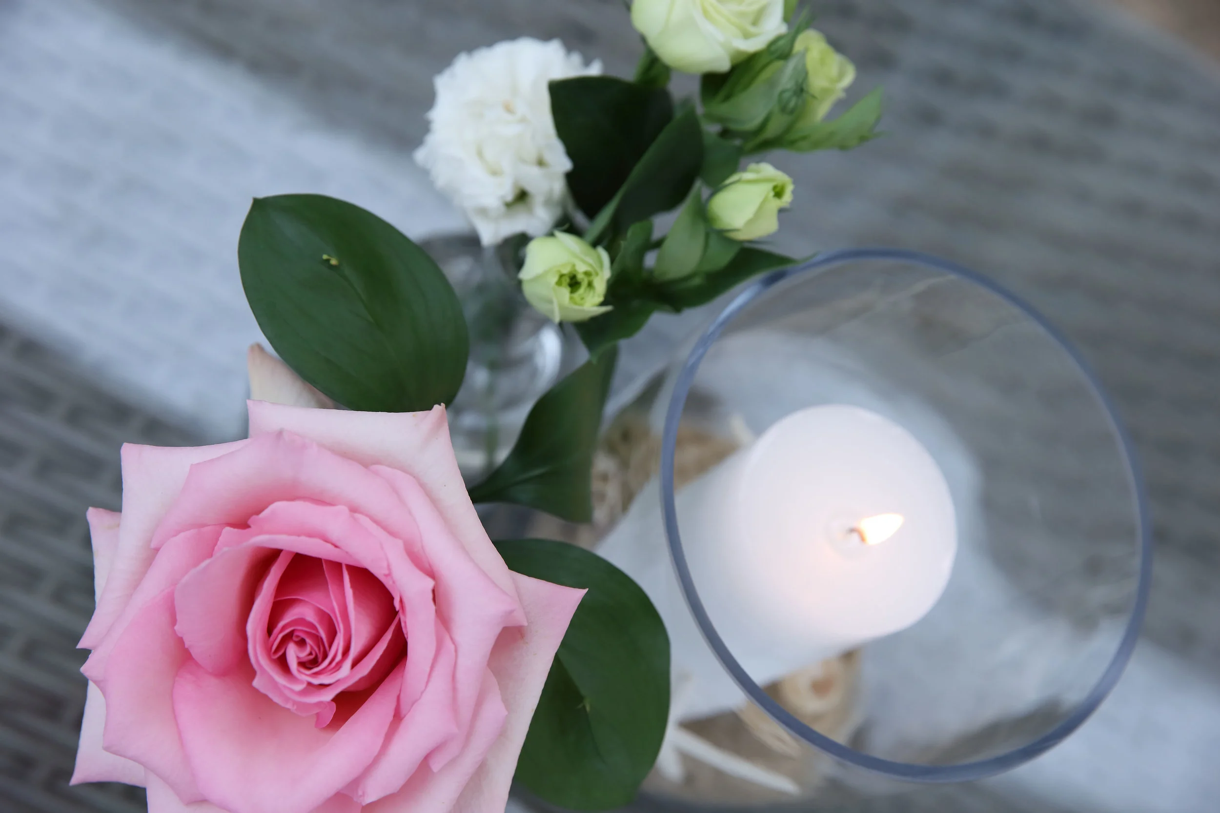 Pink roses and candles wedding decoration planned by Sydney Wedding planner Samantha Burke Events