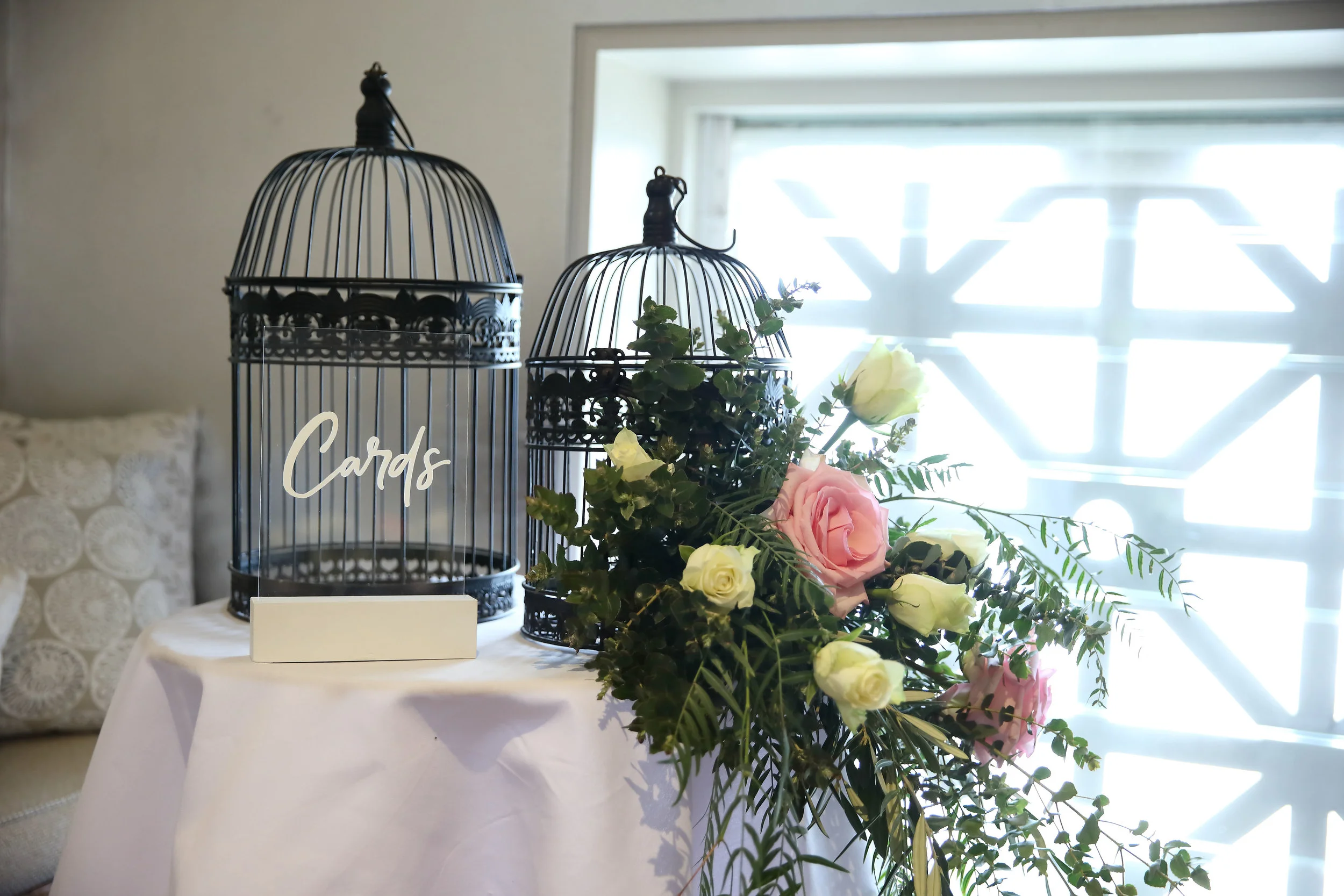 Bird cage wishing well and acrylic cards sign decorated with flowers