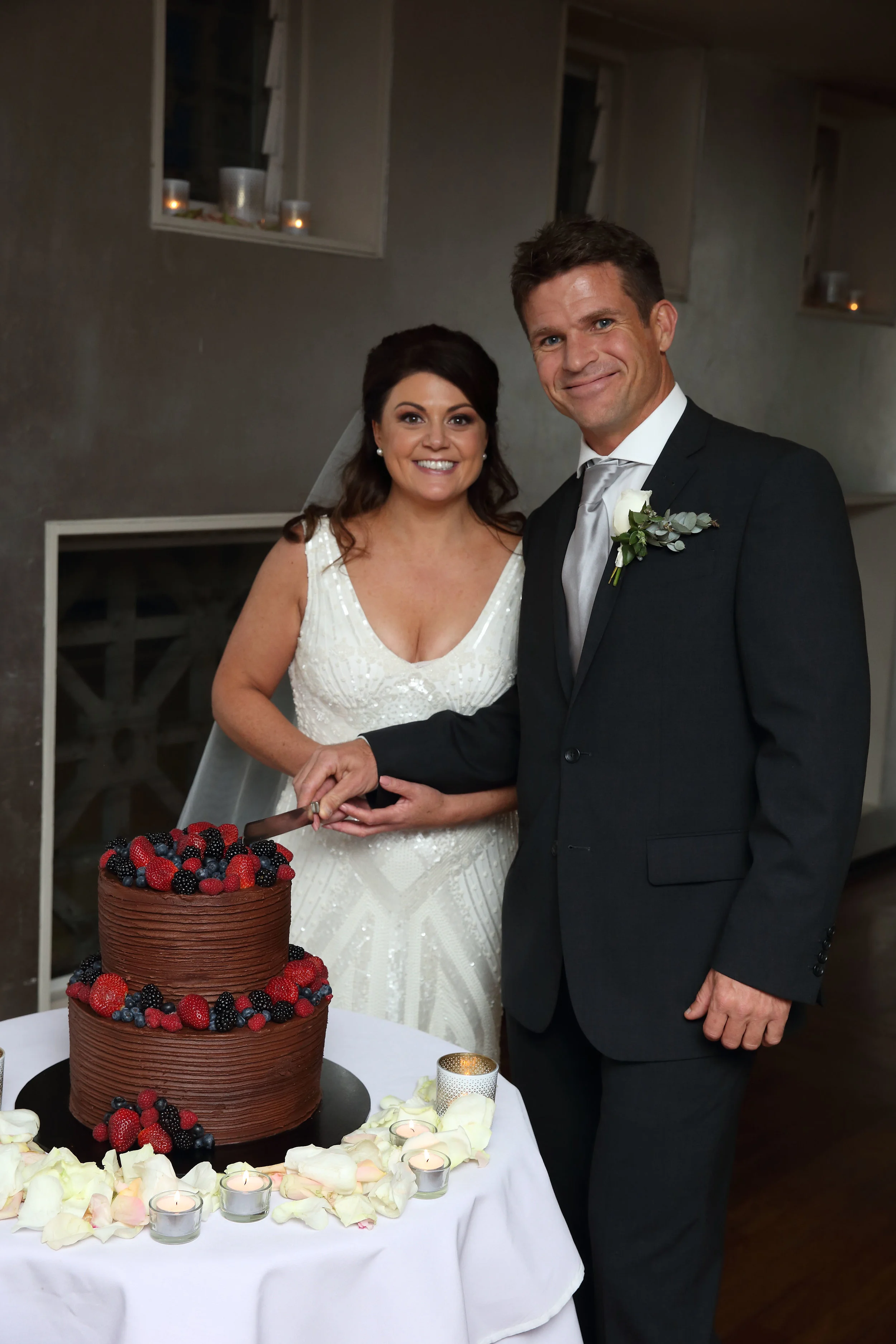 Bride and Groom cutting the cake