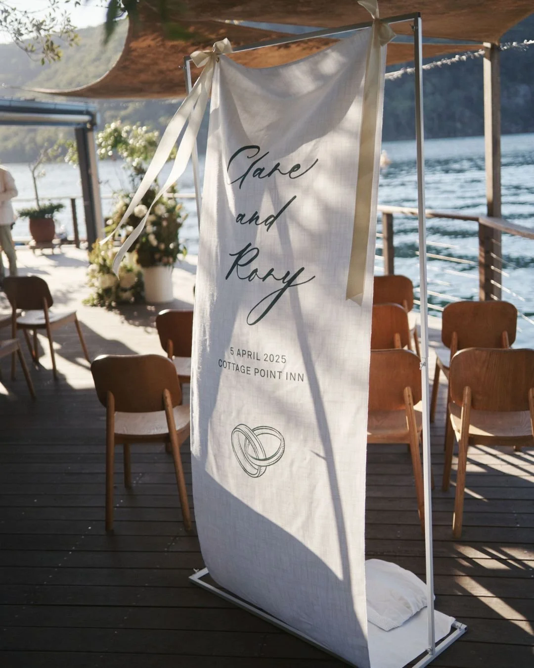 Rory &amp; Clare&rsquo;s elegant celebration at the intimate waterfront @cottagepointinn was filled with heartfelt moments, flowing music by @tilleemusic, and the most beautiful floral design by @theivyleague_au made it all came together so perfectly