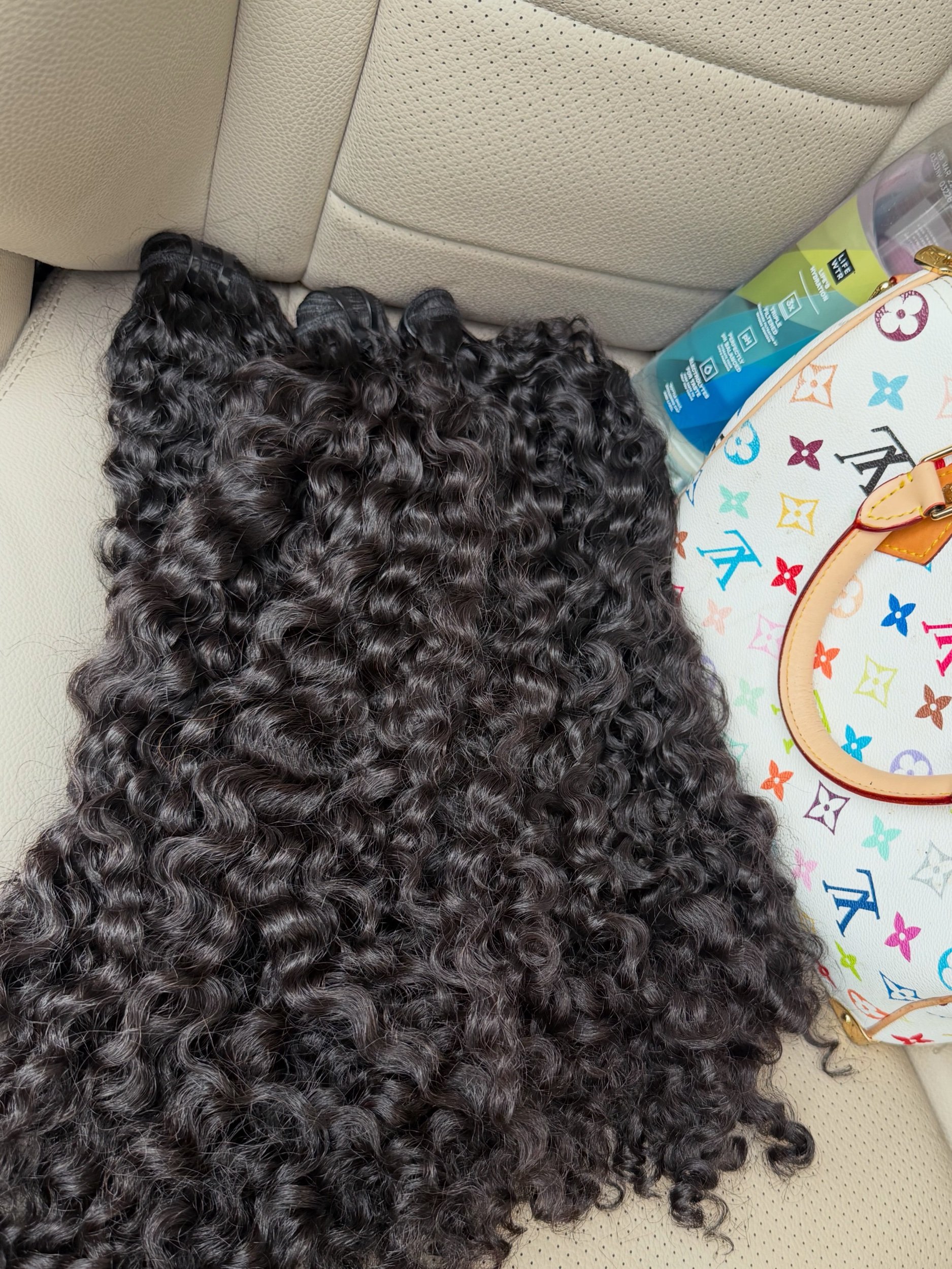 Jet Black Deep Curly Extensions