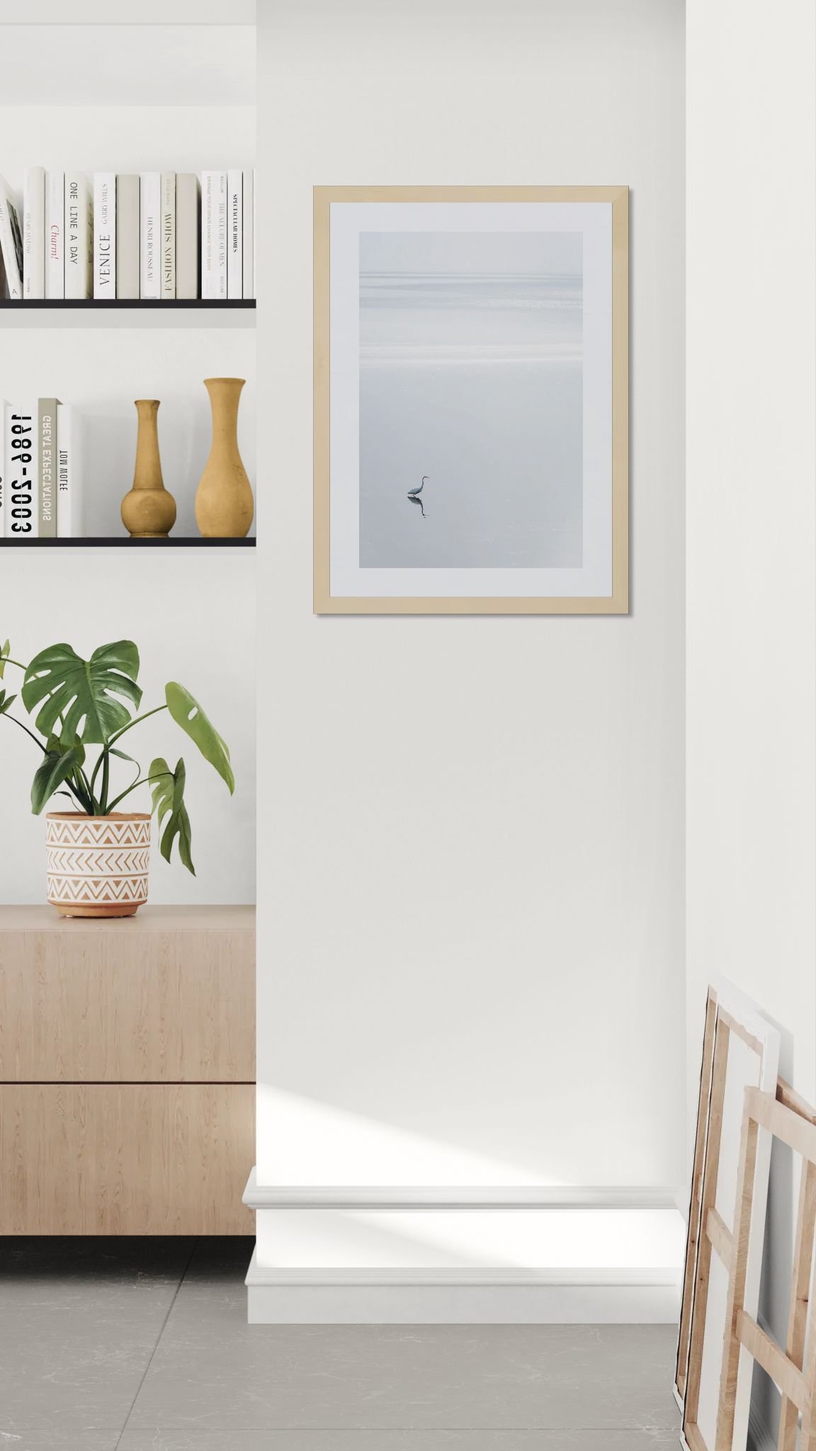 Living room corner with a cabinet and shelving.jpeg