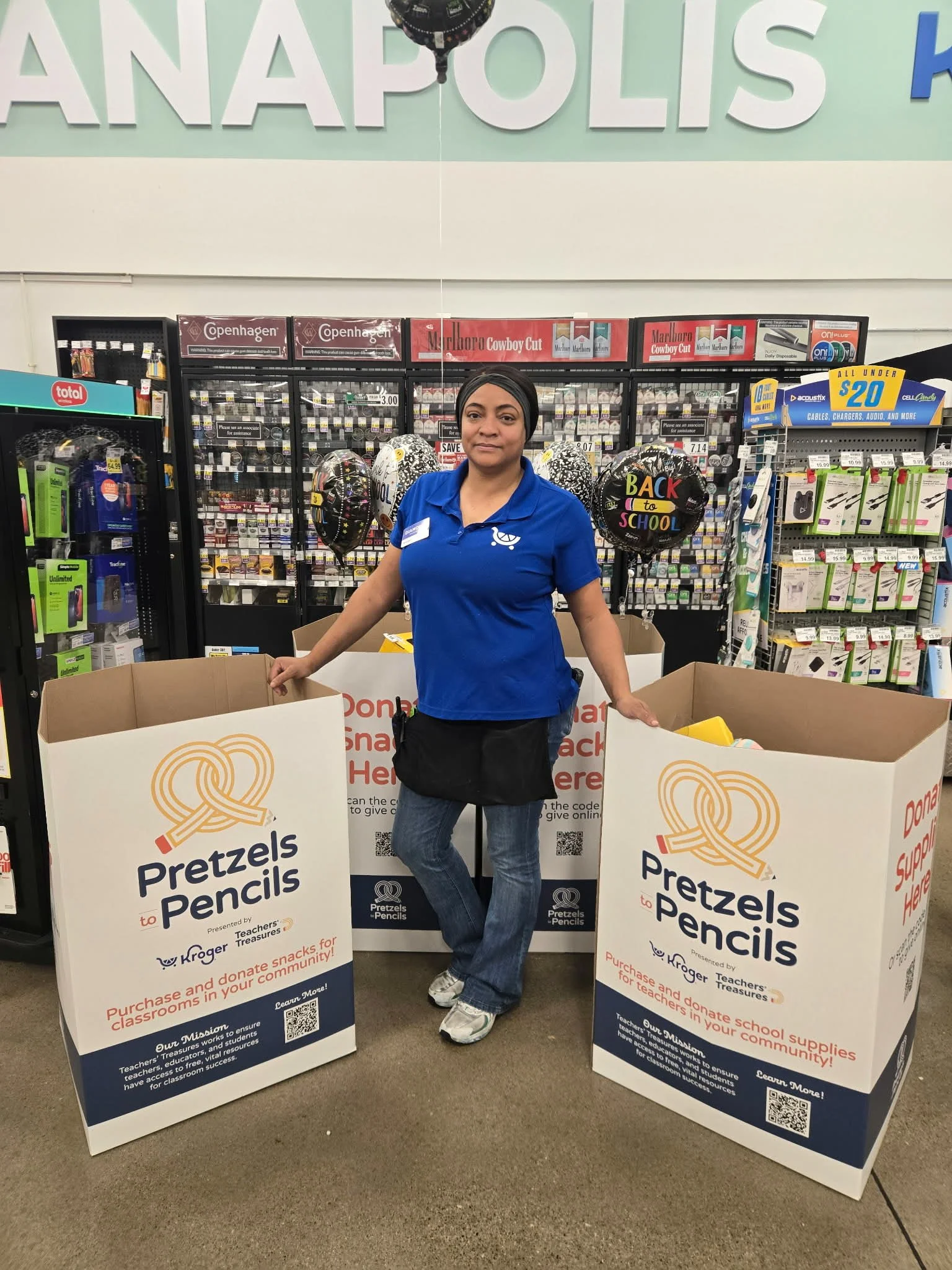 Kroger employee and boxes.jpg