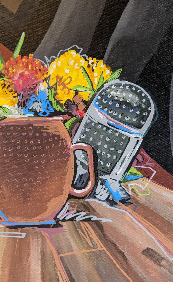 Close up details of Street art still life painting with copper mug, vintage microphone, and flowers on wood table with a graffiti background