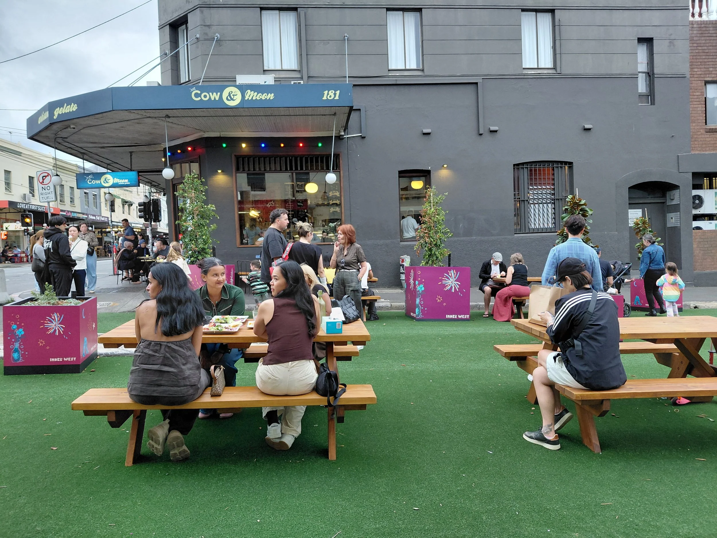 London Street Enmore, the intersection with Enmore Road now a community space where people congregate to meet, eat and play.