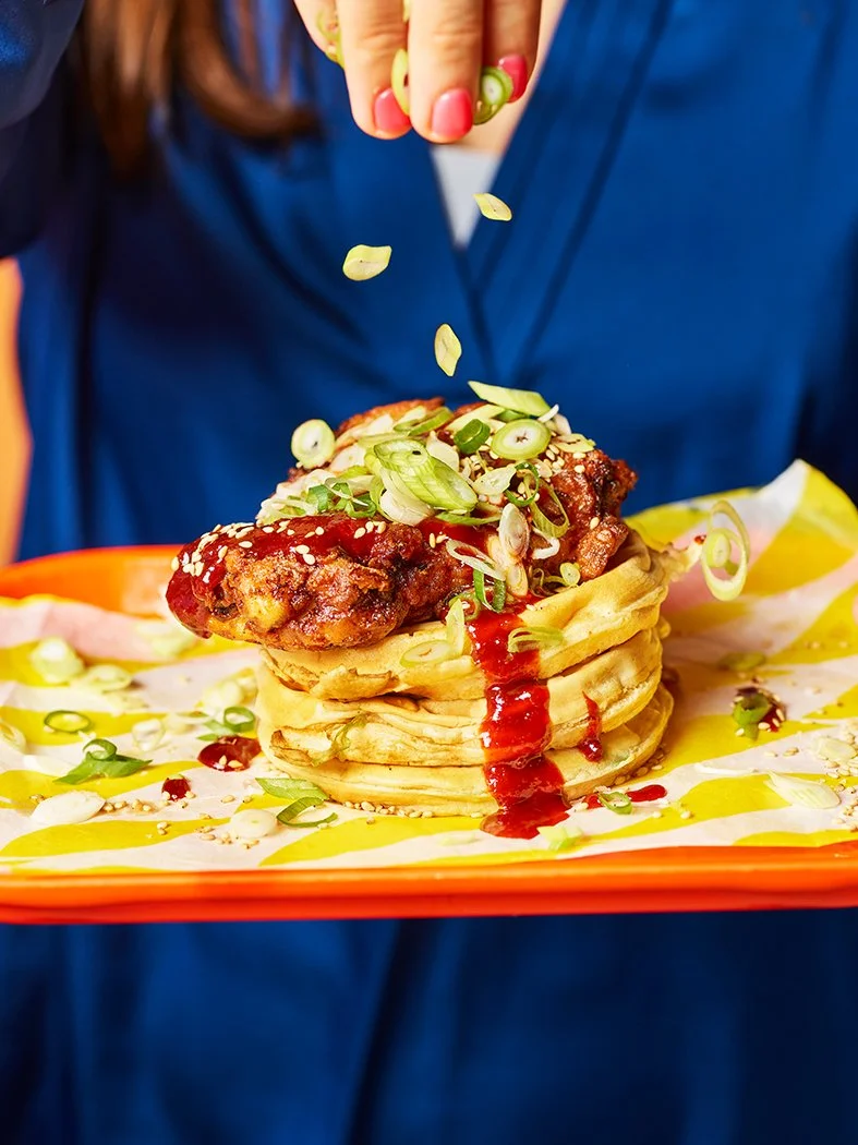 Fried chicken, waffles and gochujang sauce from The Brunch Club cookbook.  Photography by food photographer Danielle Wood.