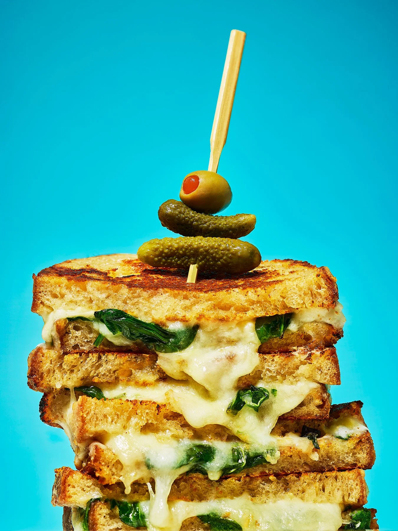 Cheese toastie with lots of melted cheese and cheese pulls. Photography by Danielle Wood.