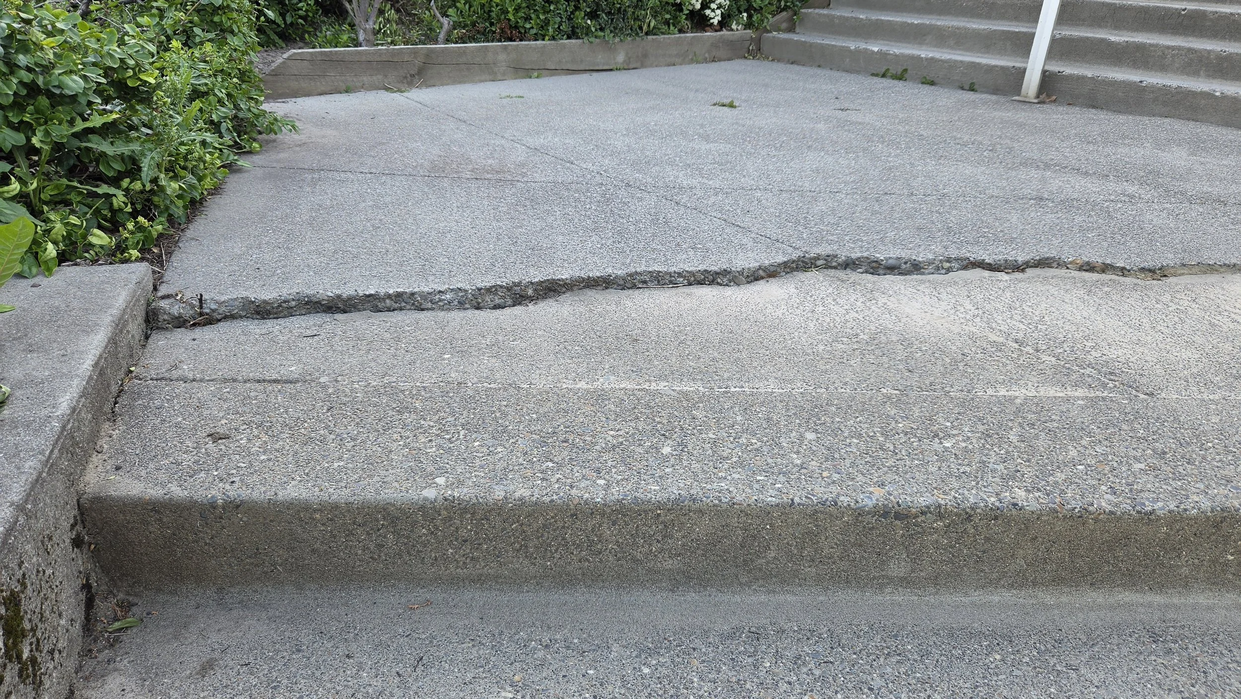 Broken Concrete on Steps - Trip Hazard