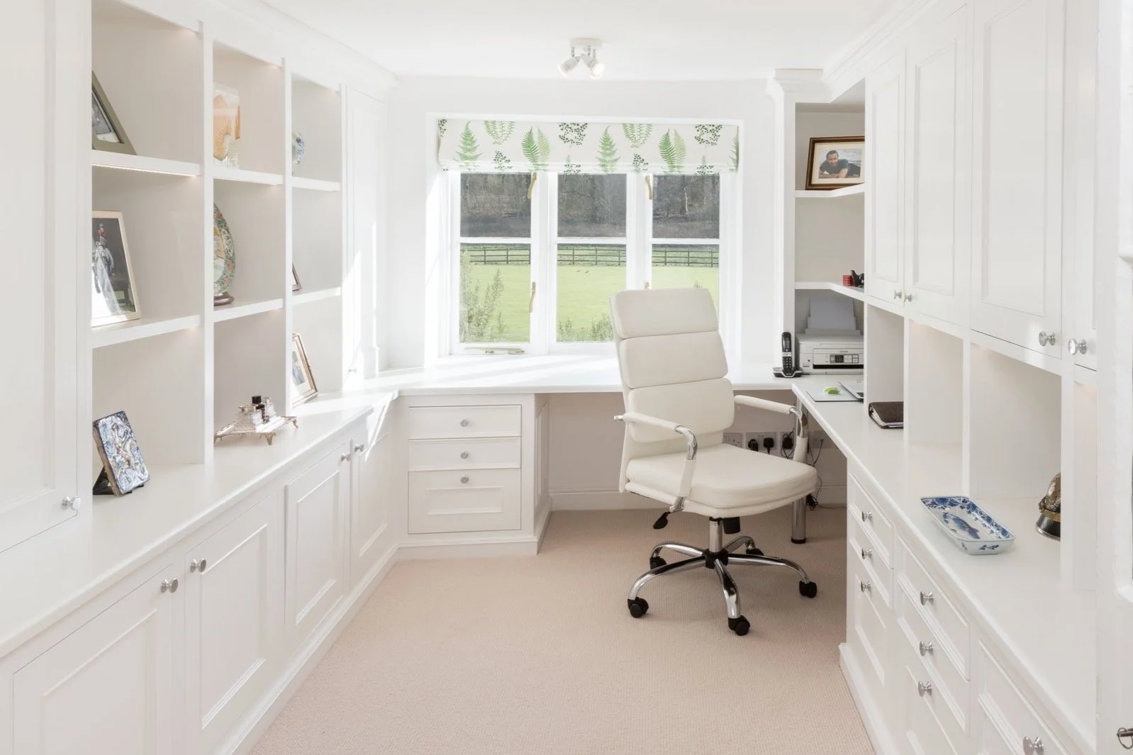 White painted office room with bespoke fitted cabinetry 