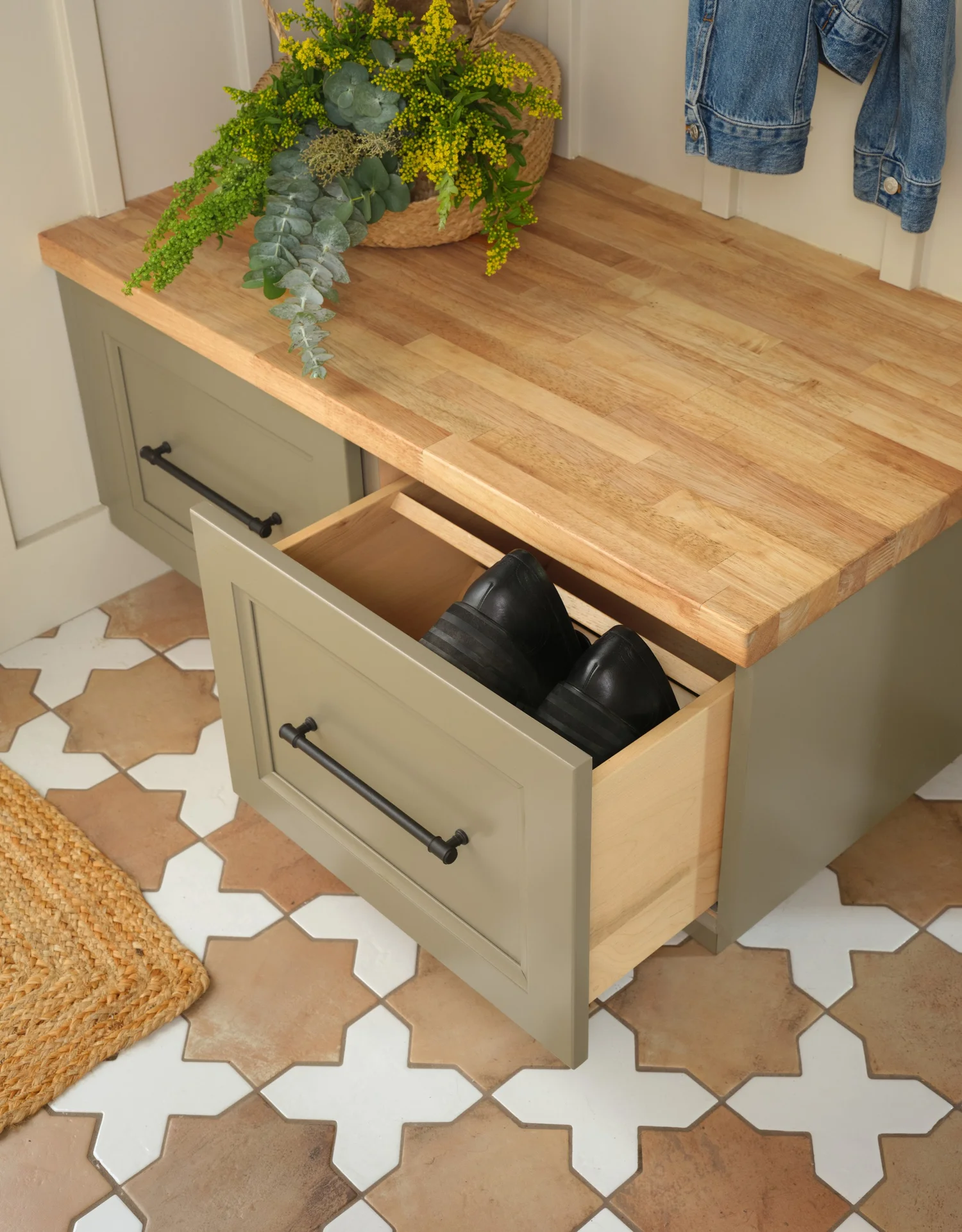 Mudroom bench drawer with slots that hold shoes side by side