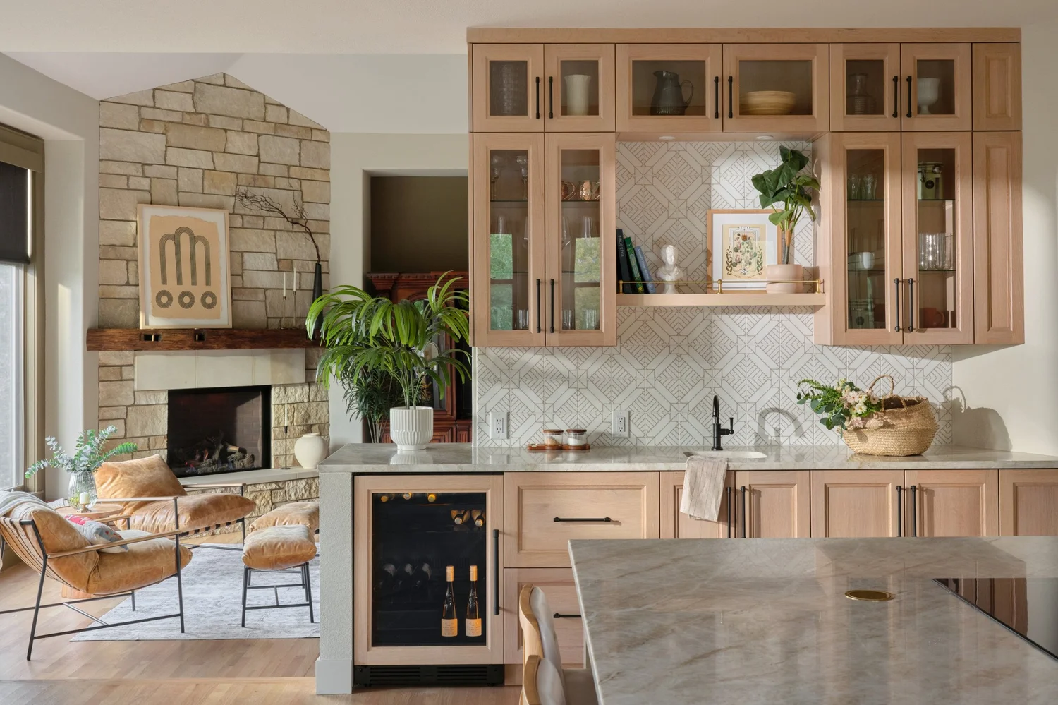 Beverage station in daylight with the fireplace in the living room beyond