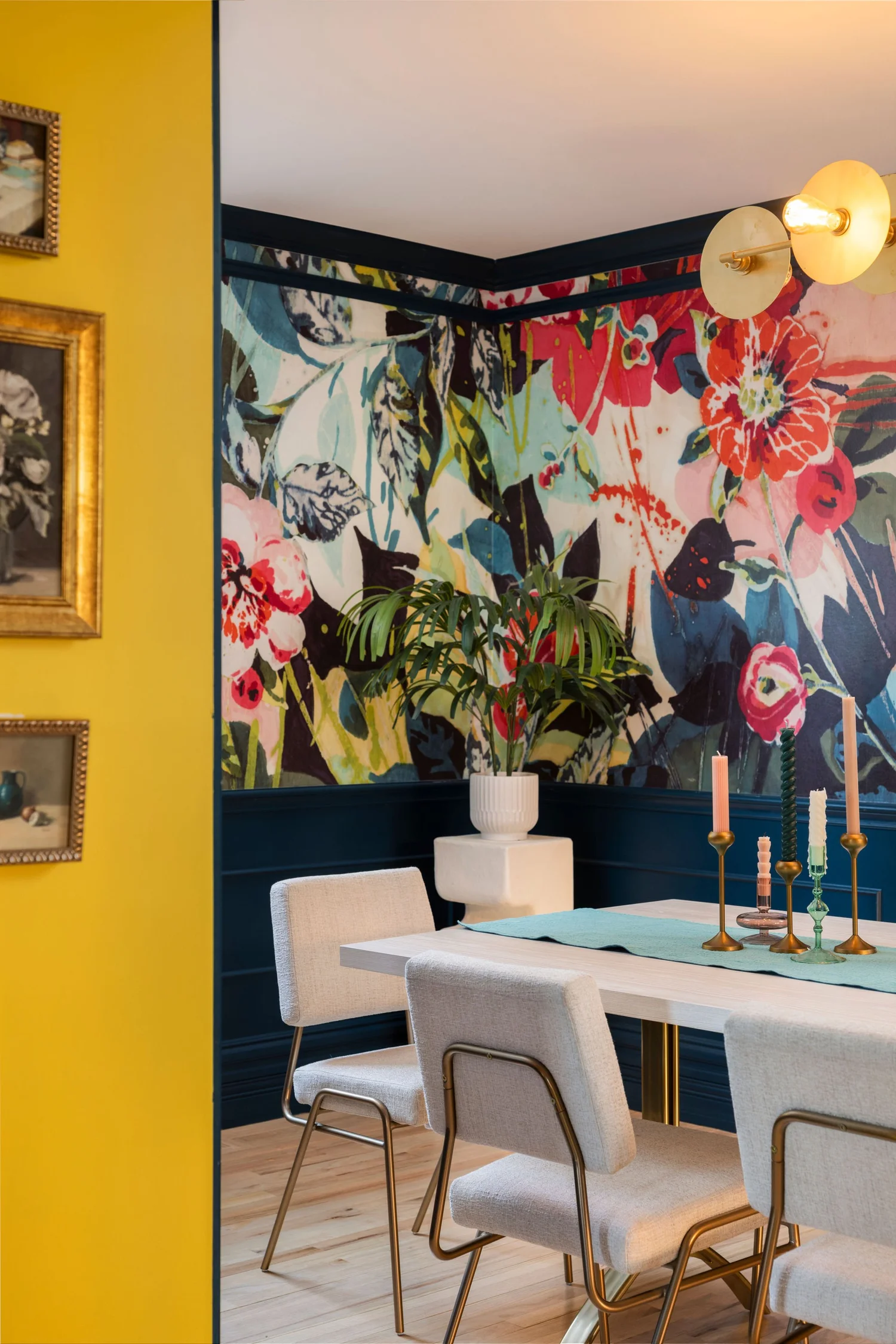 Yellow shelving meeting the dining room floral mural